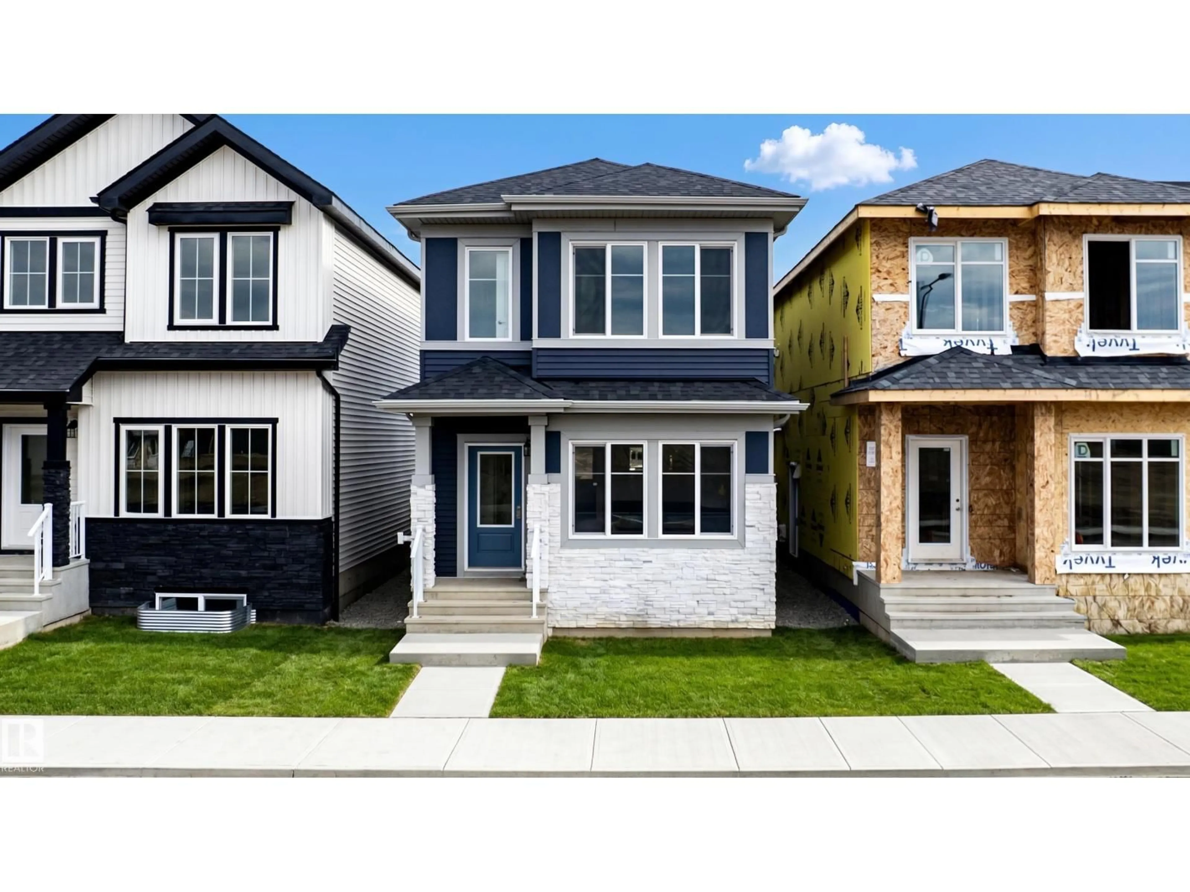 Home with vinyl exterior material, street for NE - 231 157 AV, Edmonton Alberta T5Y4M3