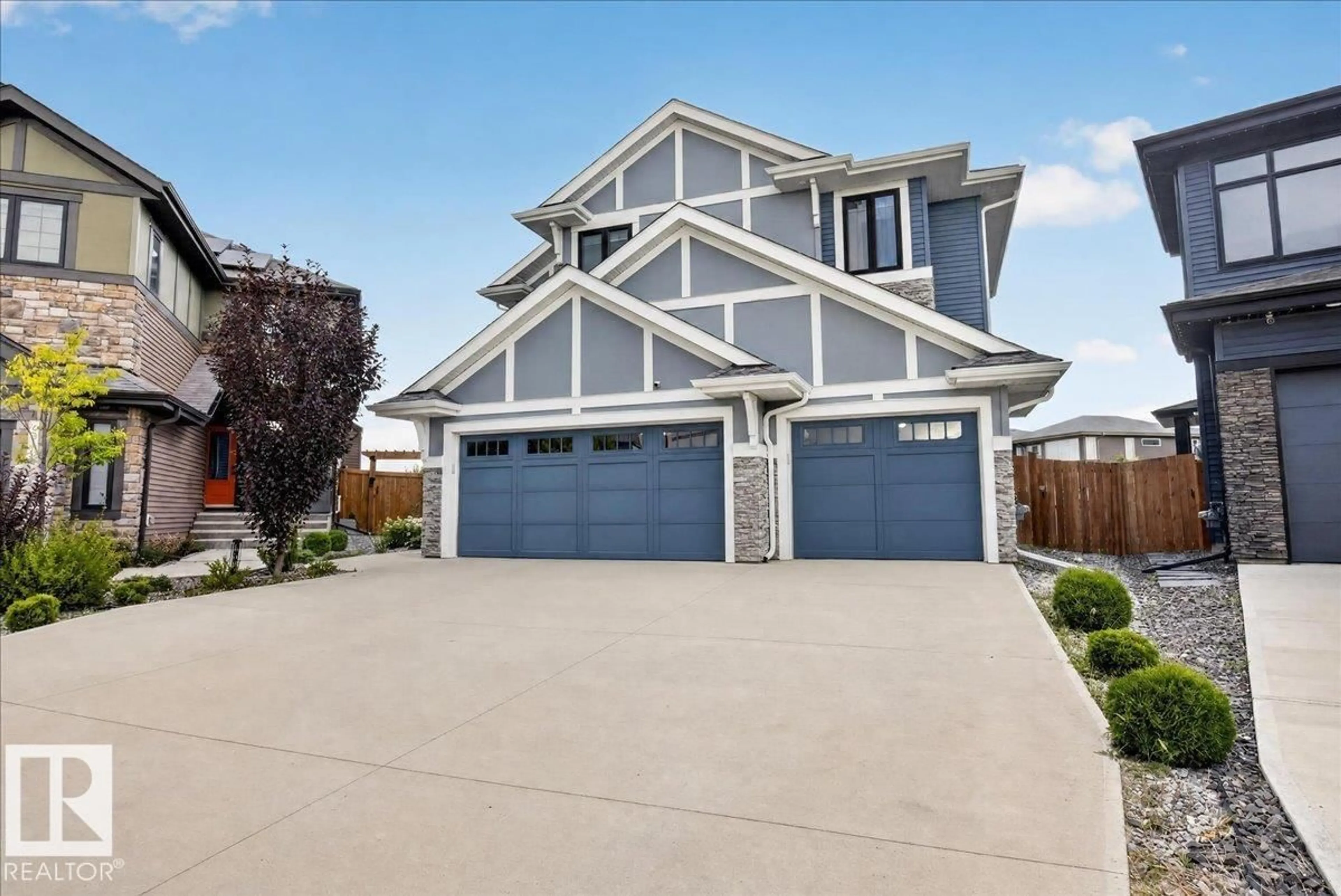 Home with vinyl exterior material, street for SW - 6813 KNOX LO, Edmonton Alberta T6W4R3