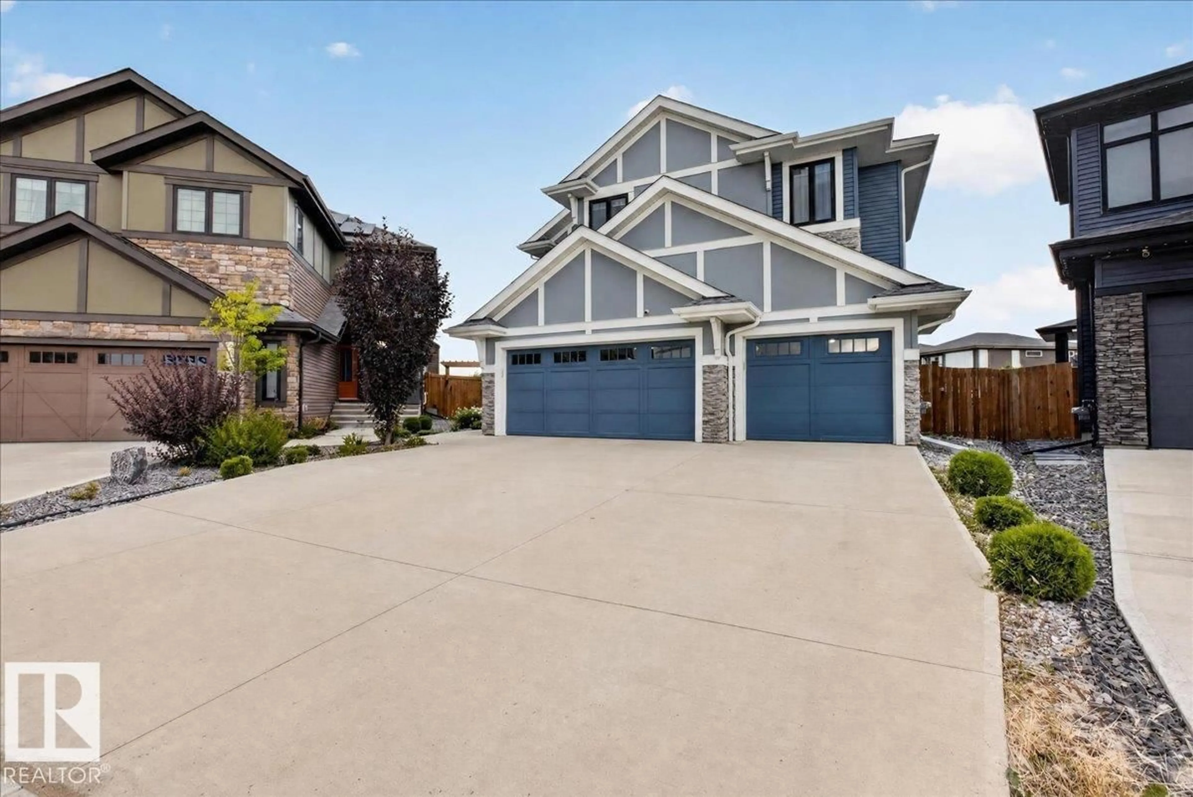 Home with vinyl exterior material, street for SW - 6813 KNOX LO, Edmonton Alberta T6W4R3