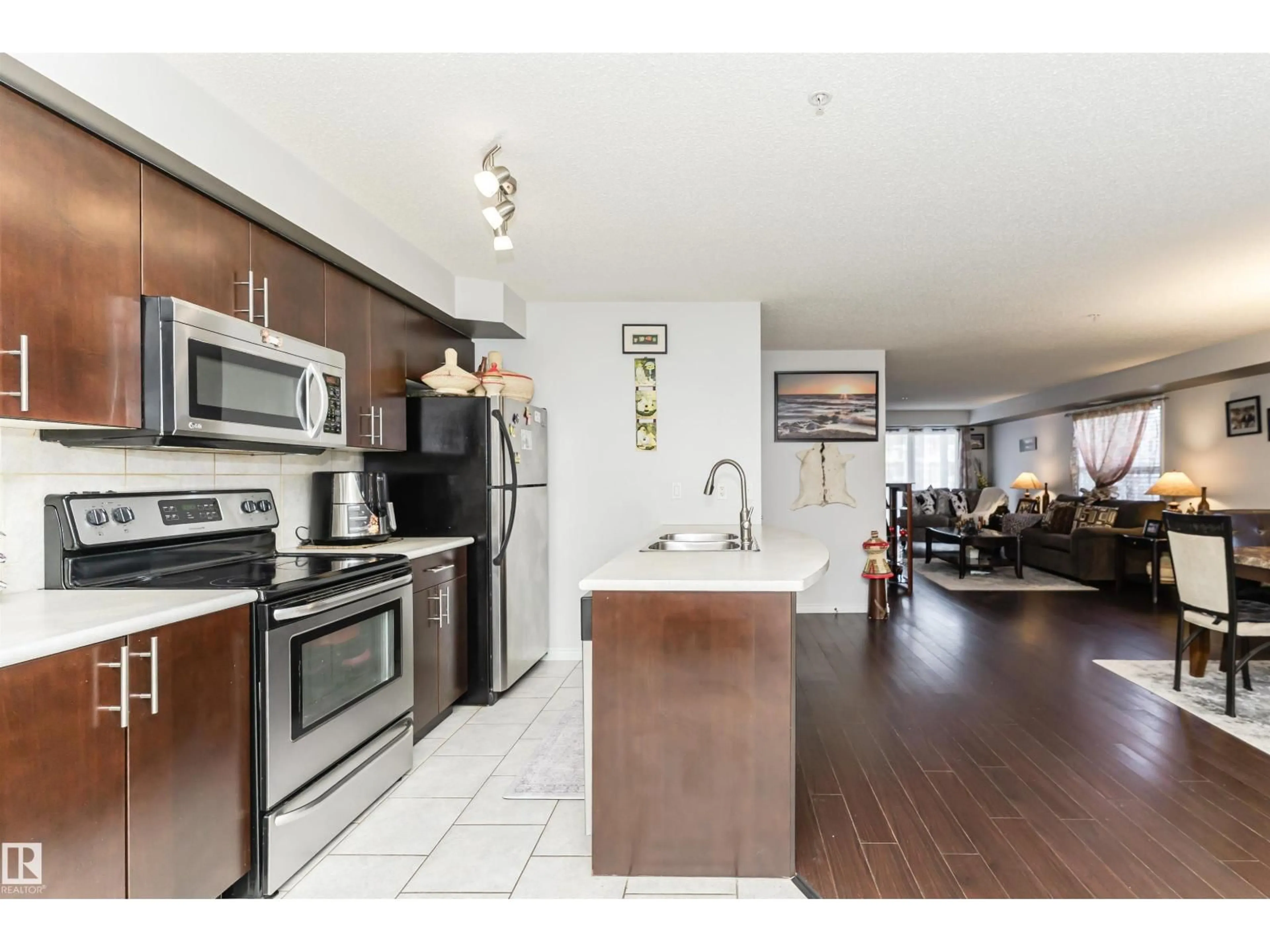 Open concept kitchen, unknown for #107 - 10118 106 AV, Edmonton Alberta T5H0B8