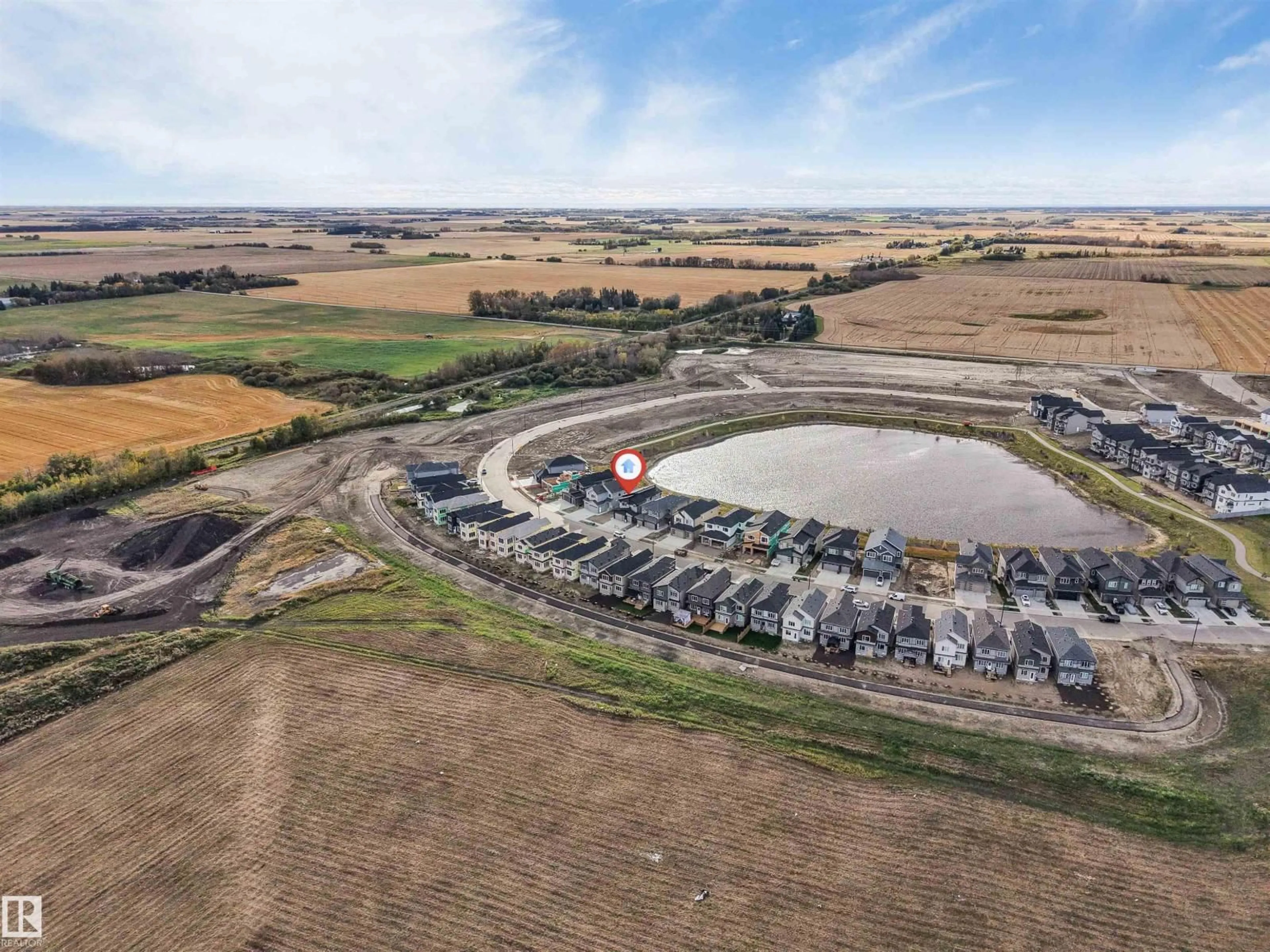 A pic from outside/outdoor area/front of a property/back of a property/a pic from drone, water/lake/river/ocean view for 229 CRYSTAL CREEK DR, Leduc Alberta T9E0X6