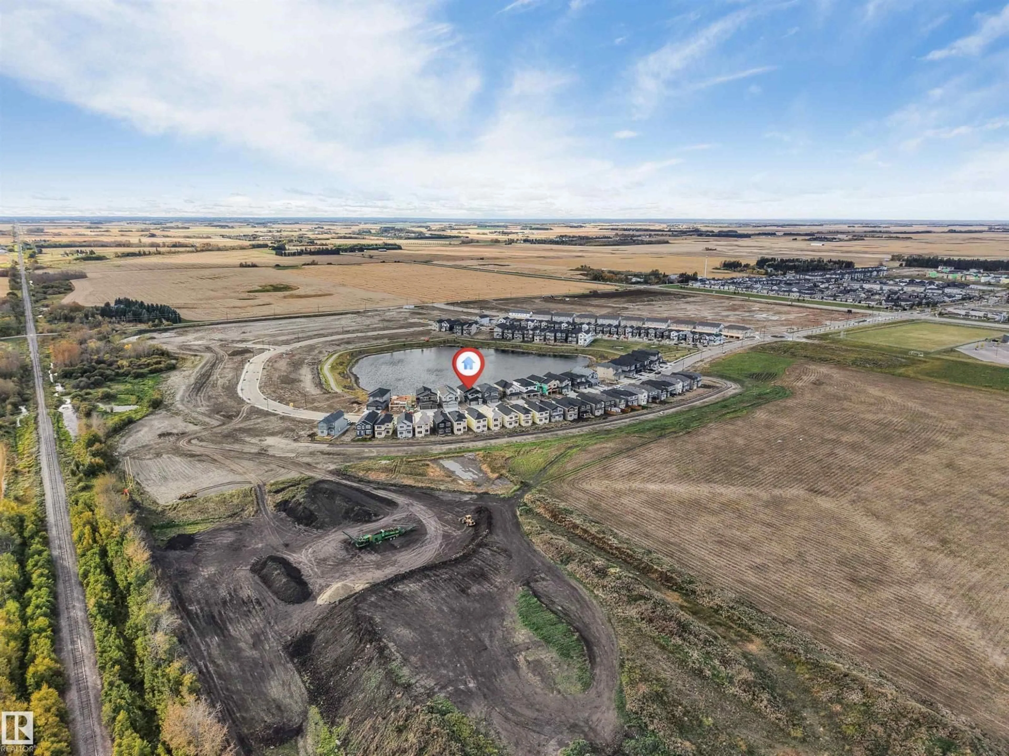 A pic from outside/outdoor area/front of a property/back of a property/a pic from drone, mountain view for 229 CRYSTAL CREEK DR, Leduc Alberta T9E0X6