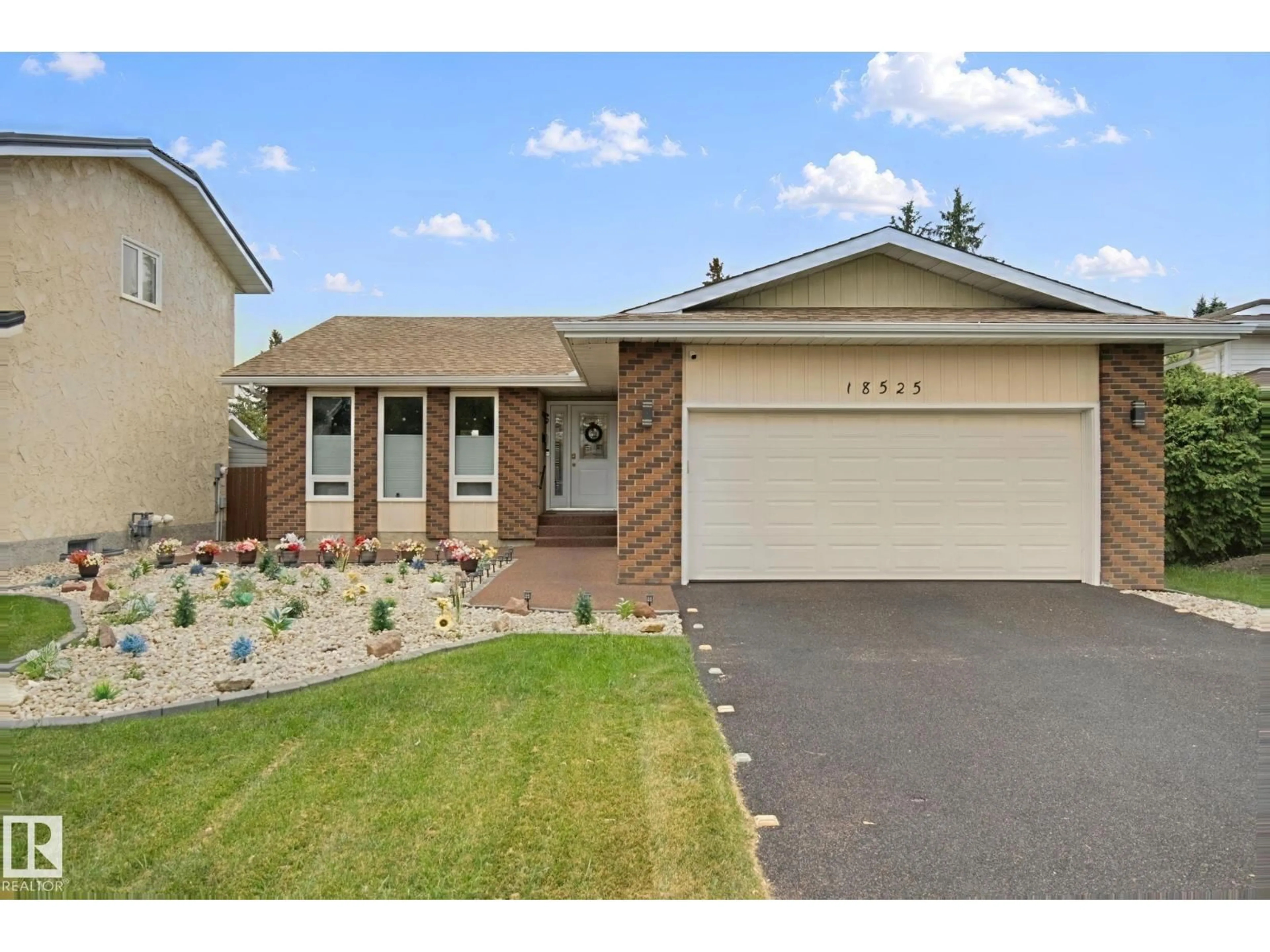Home with vinyl exterior material, street for 18525 86A AV, Edmonton Alberta T5T1J5