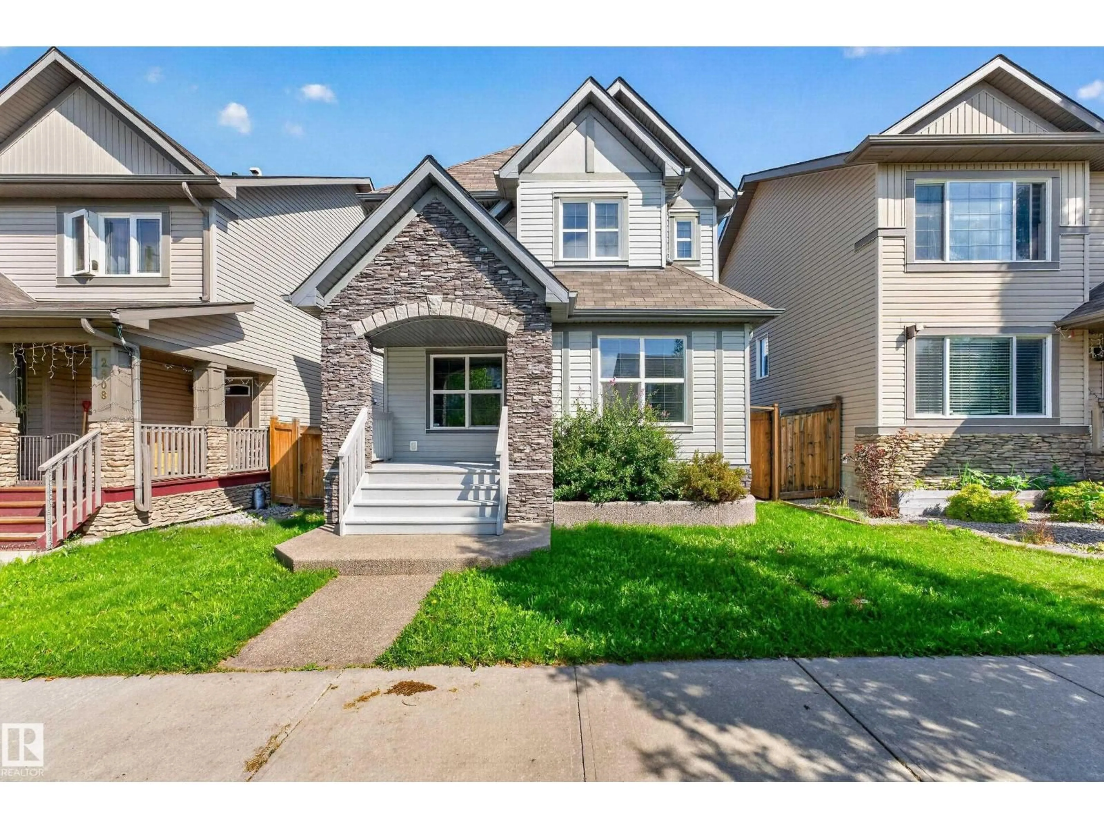 Home with brick exterior material, street for 2904 19 AV, Edmonton Alberta T6T0N6