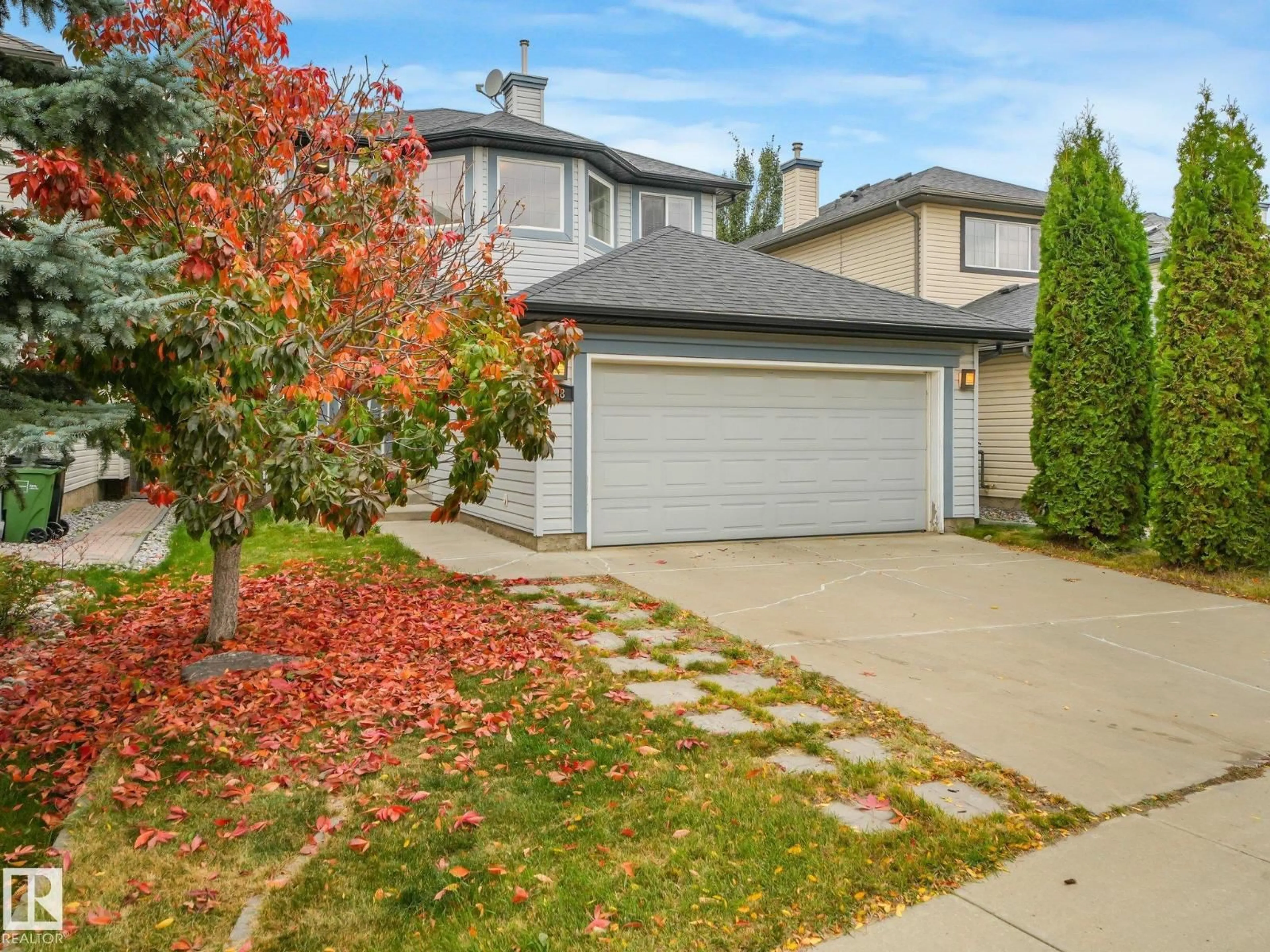 Home with vinyl exterior material, street for 458 MACEWAN RD, Edmonton Alberta T6W1V4