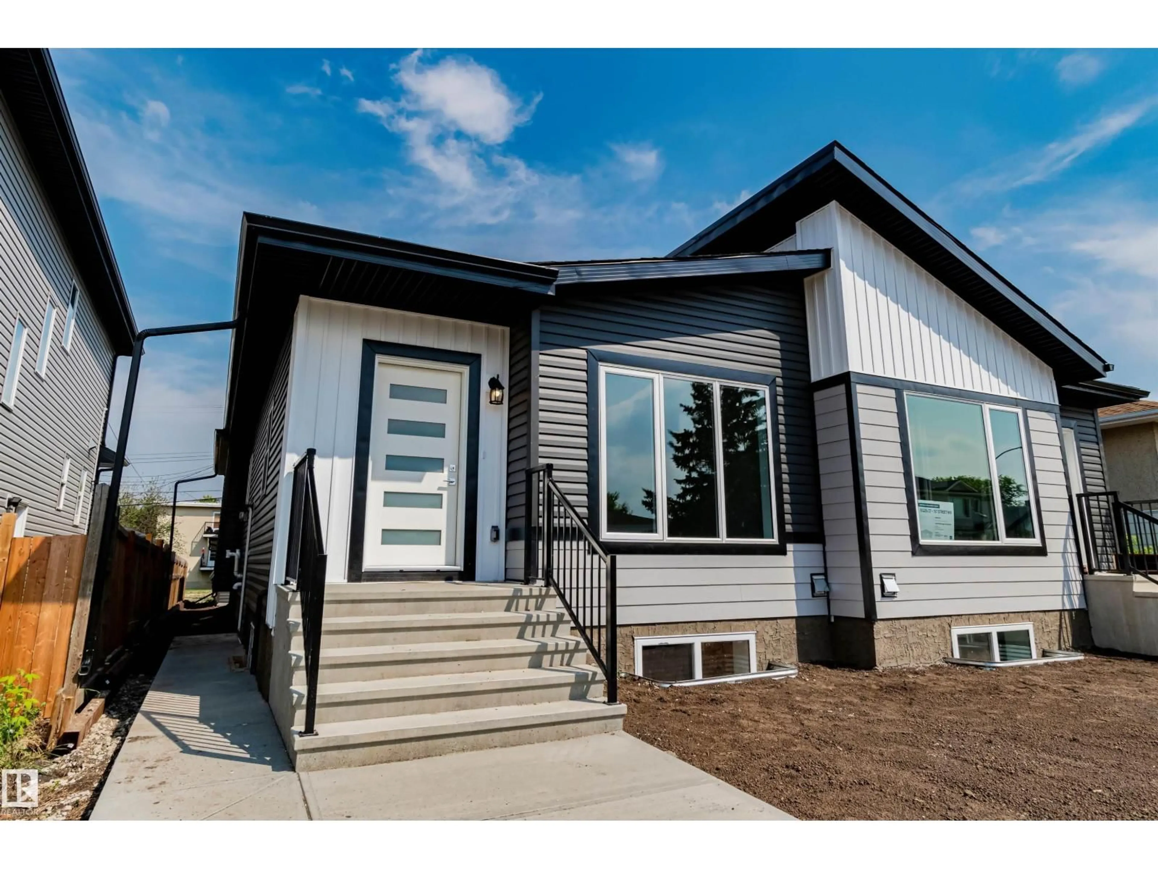 Home with vinyl exterior material, street for NW - 12117 85 ST, Edmonton Alberta T5B3G5