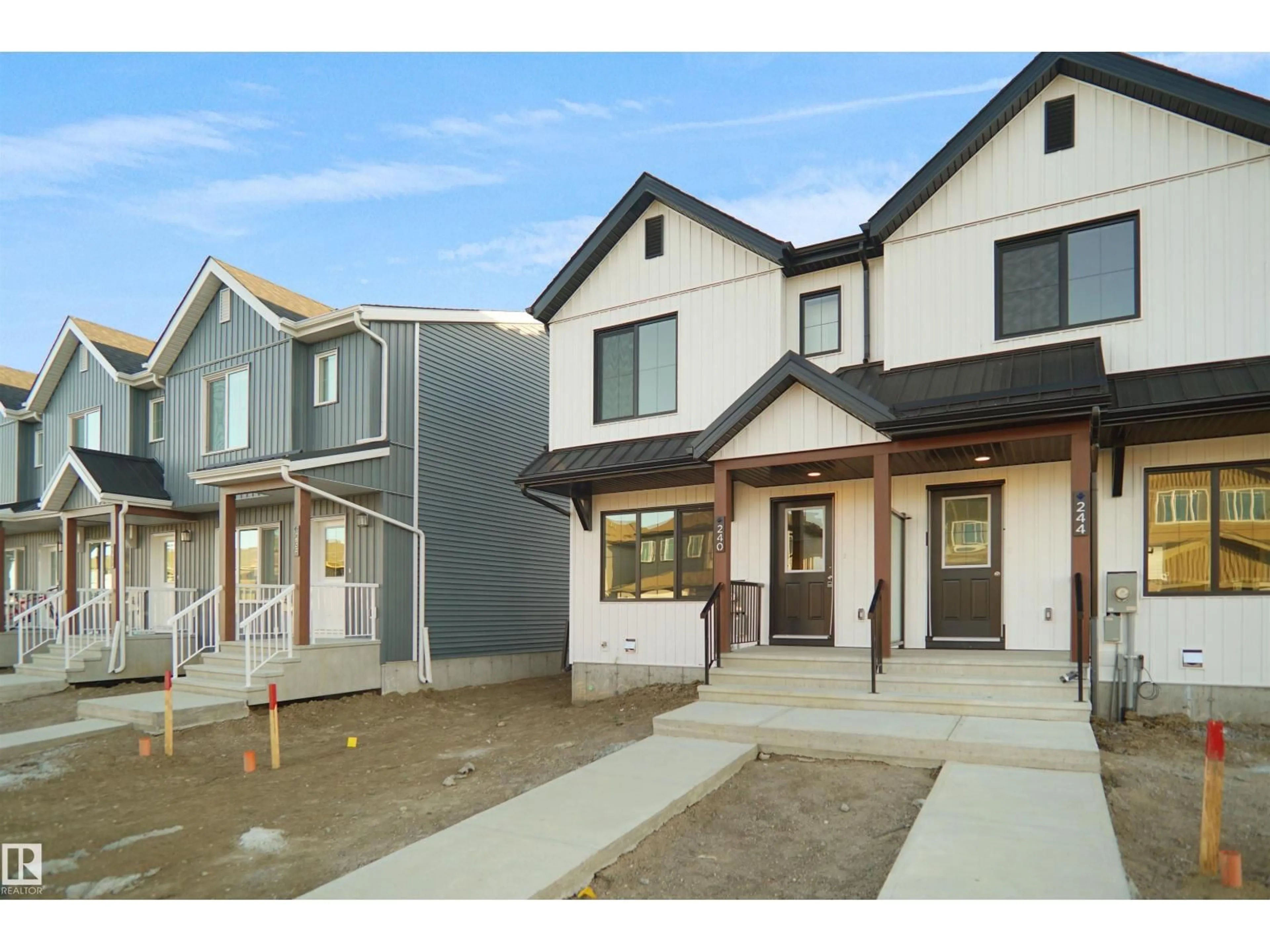 Home with vinyl exterior material, street for 20934 24 AV, Edmonton Alberta T6M3B9