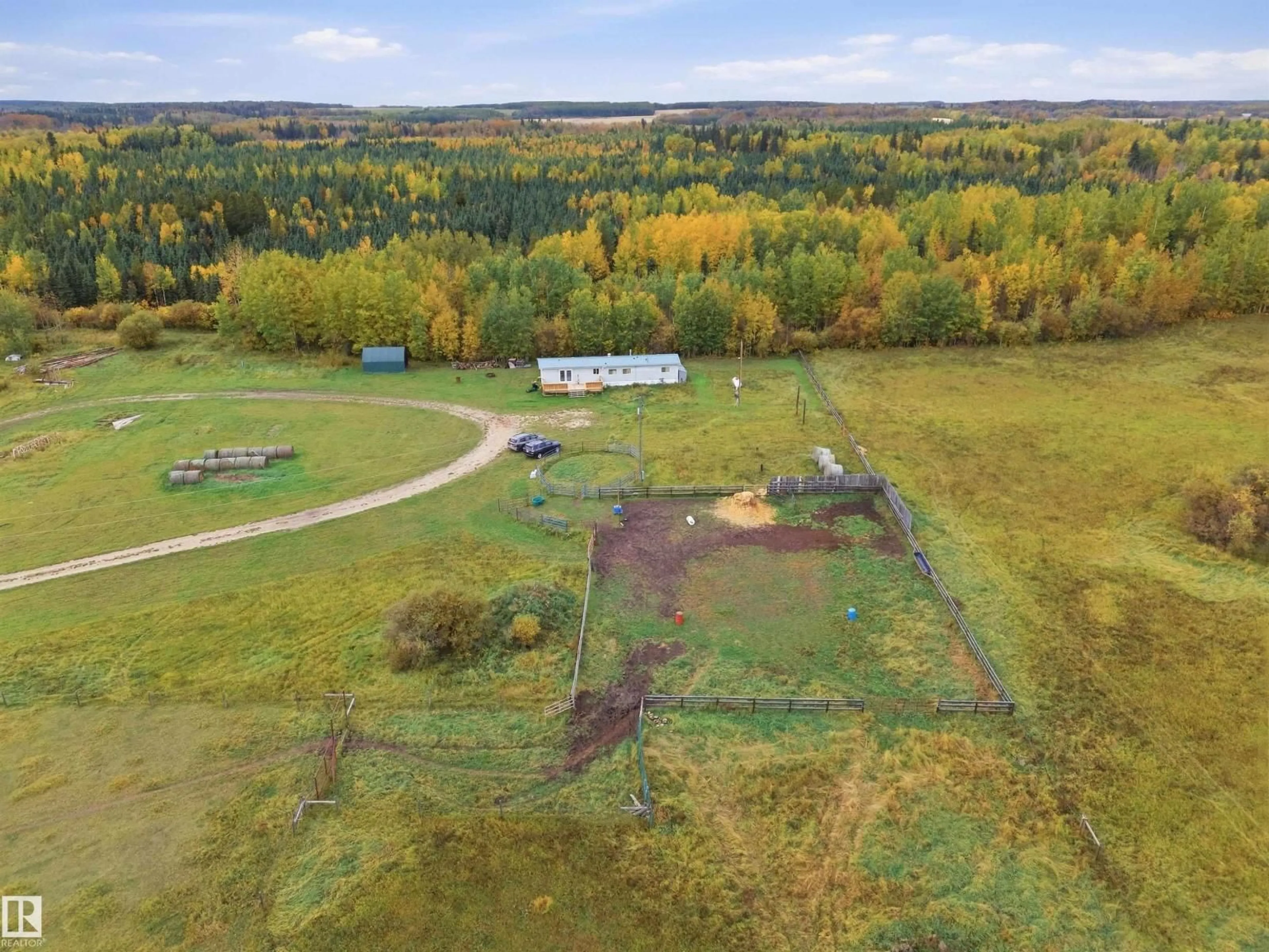 A pic from outside/outdoor area/front of a property/back of a property/a pic from drone, forest/trees view for 7526 TWP RD 523, Rural Yellowhead Alberta T0E0T0