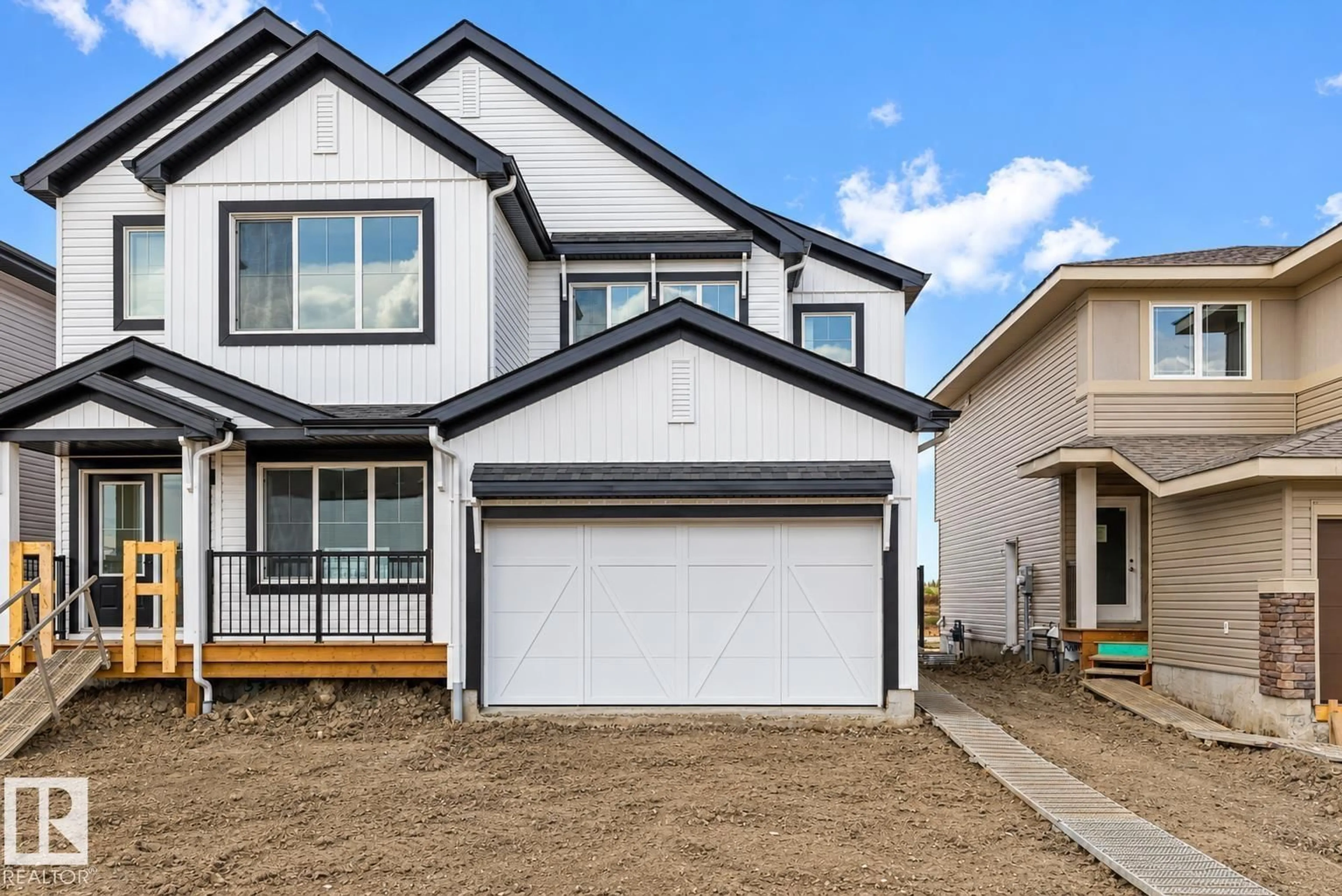Home with vinyl exterior material, street for NE - 534 176 AV, Edmonton Alberta T5Y4J9