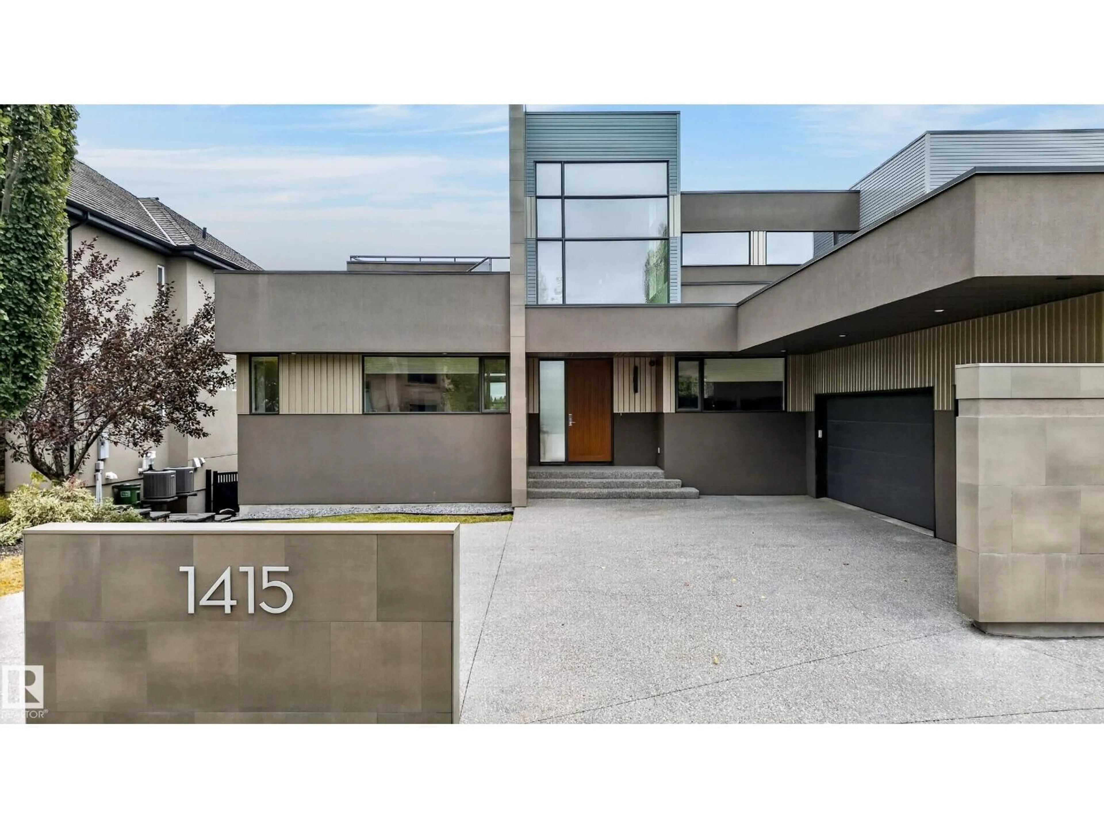 Home with brick exterior material, street for 1415 WOODWARD CR, Edmonton Alberta T6M0A3