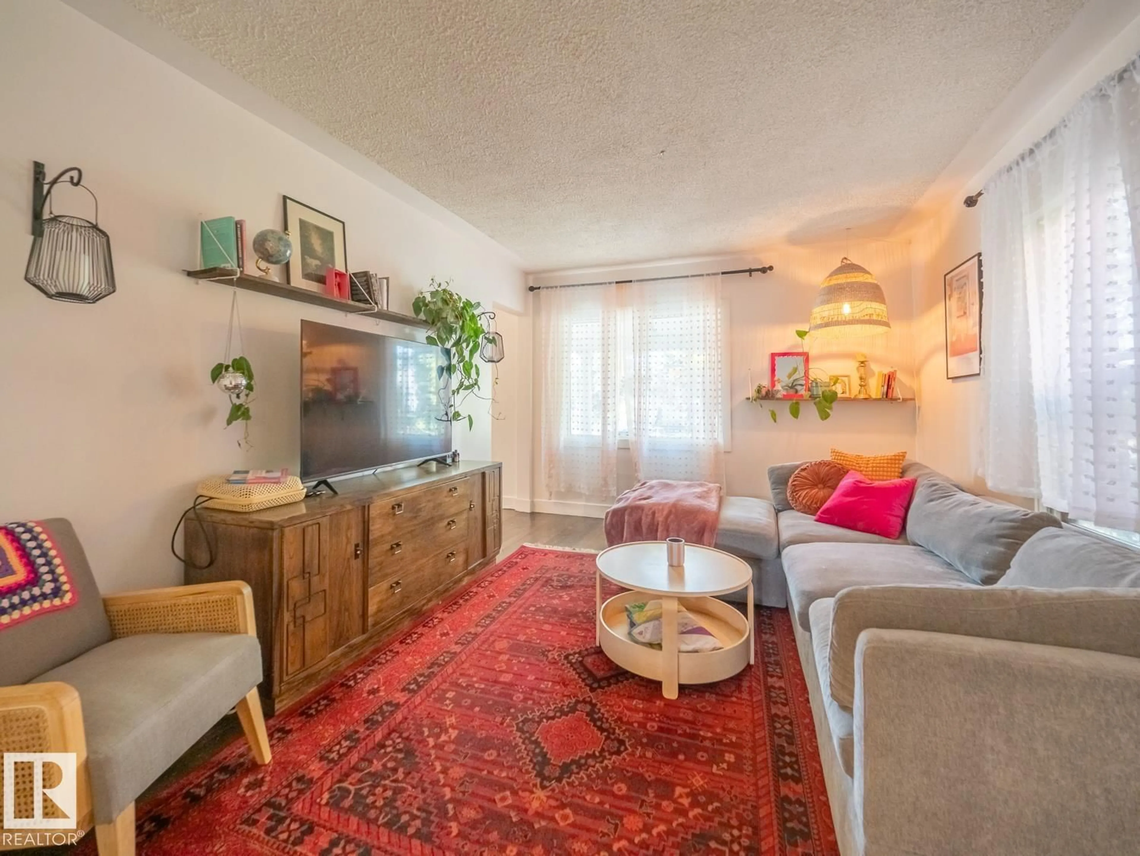 Living room with furniture, unknown for 11409 94 ST, Edmonton Alberta T5G1H5