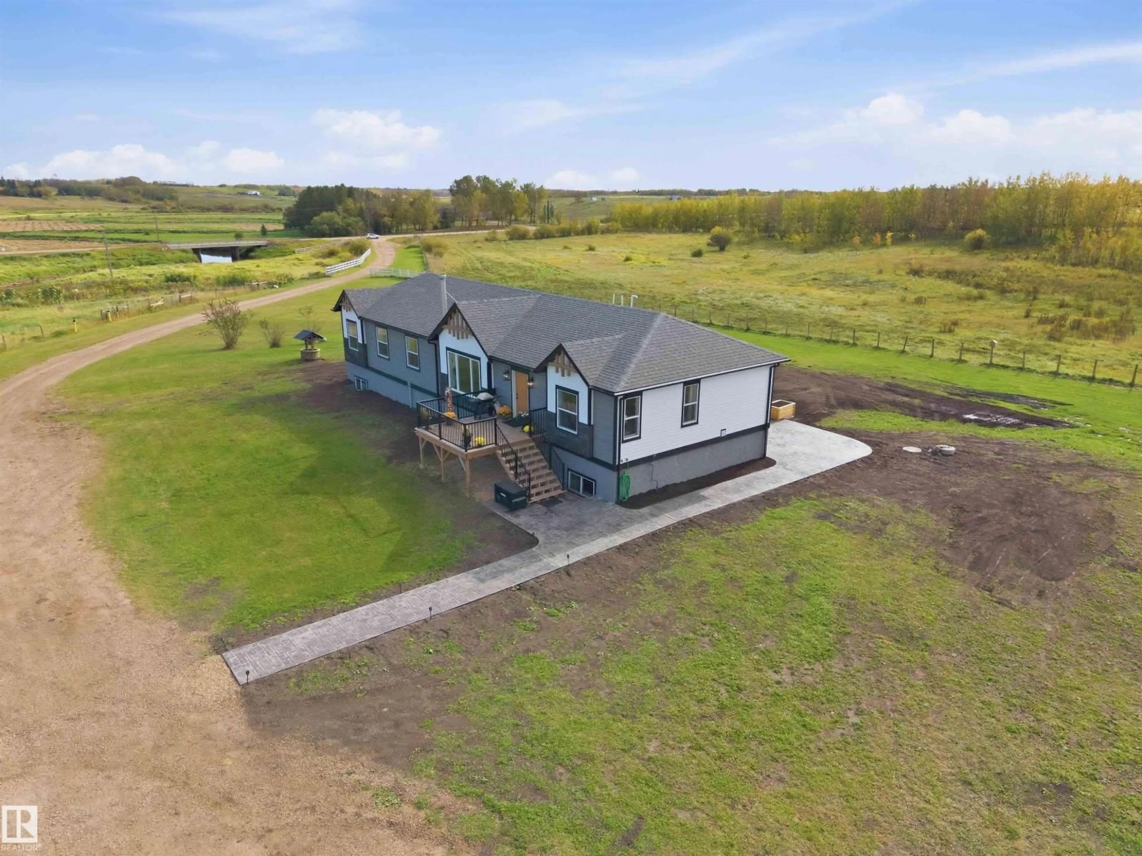 A pic from outside/outdoor area/front of a property/back of a property/a pic from drone, unknown for 58302 RGE RD 224, Rural Thorhild County Alberta T0A1N6