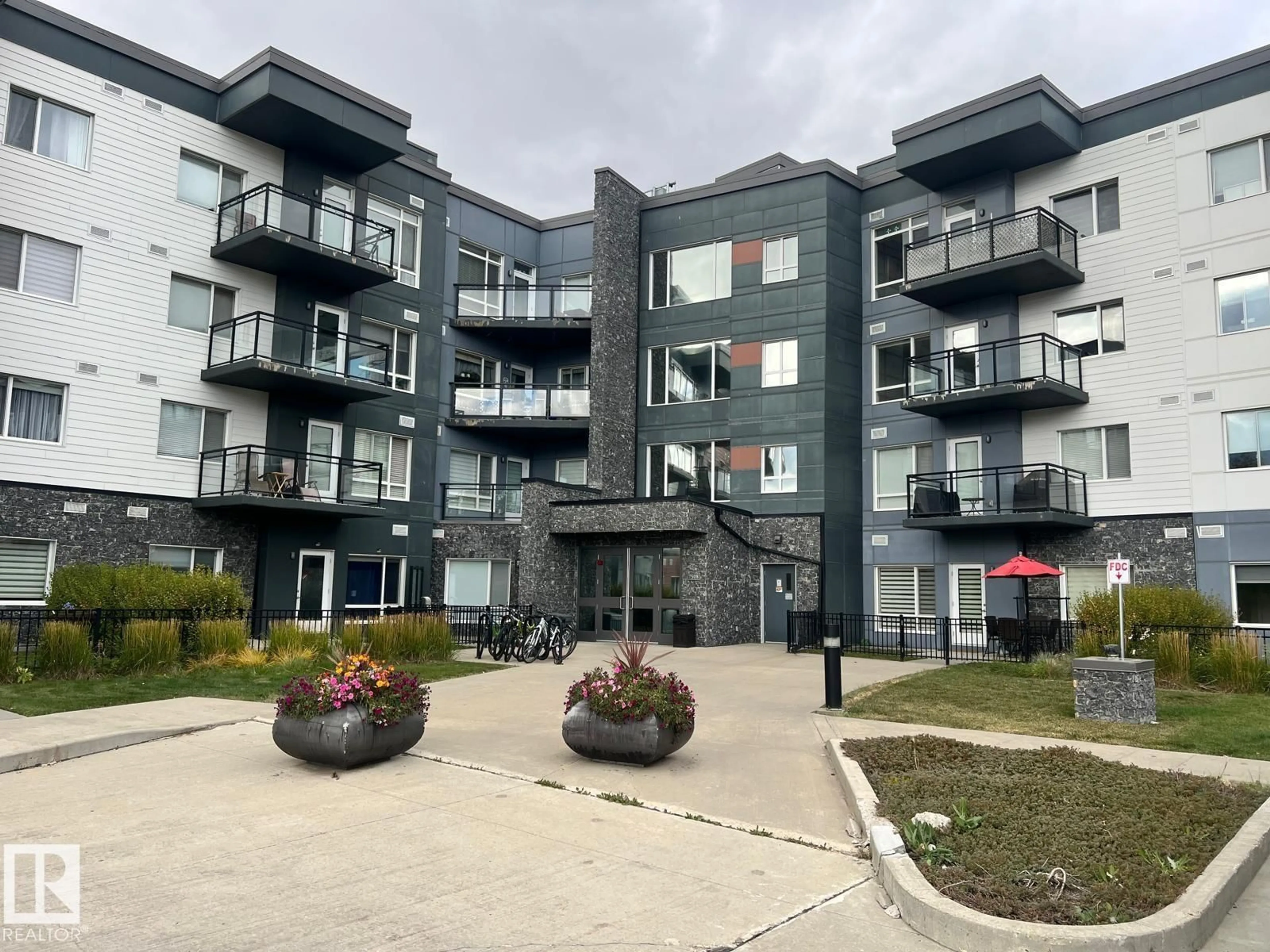 A pic from outside/outdoor area/front of a property/back of a property/a pic from drone, unknown for #203 - 7508 GETTY GA, Edmonton Alberta T5T7E6