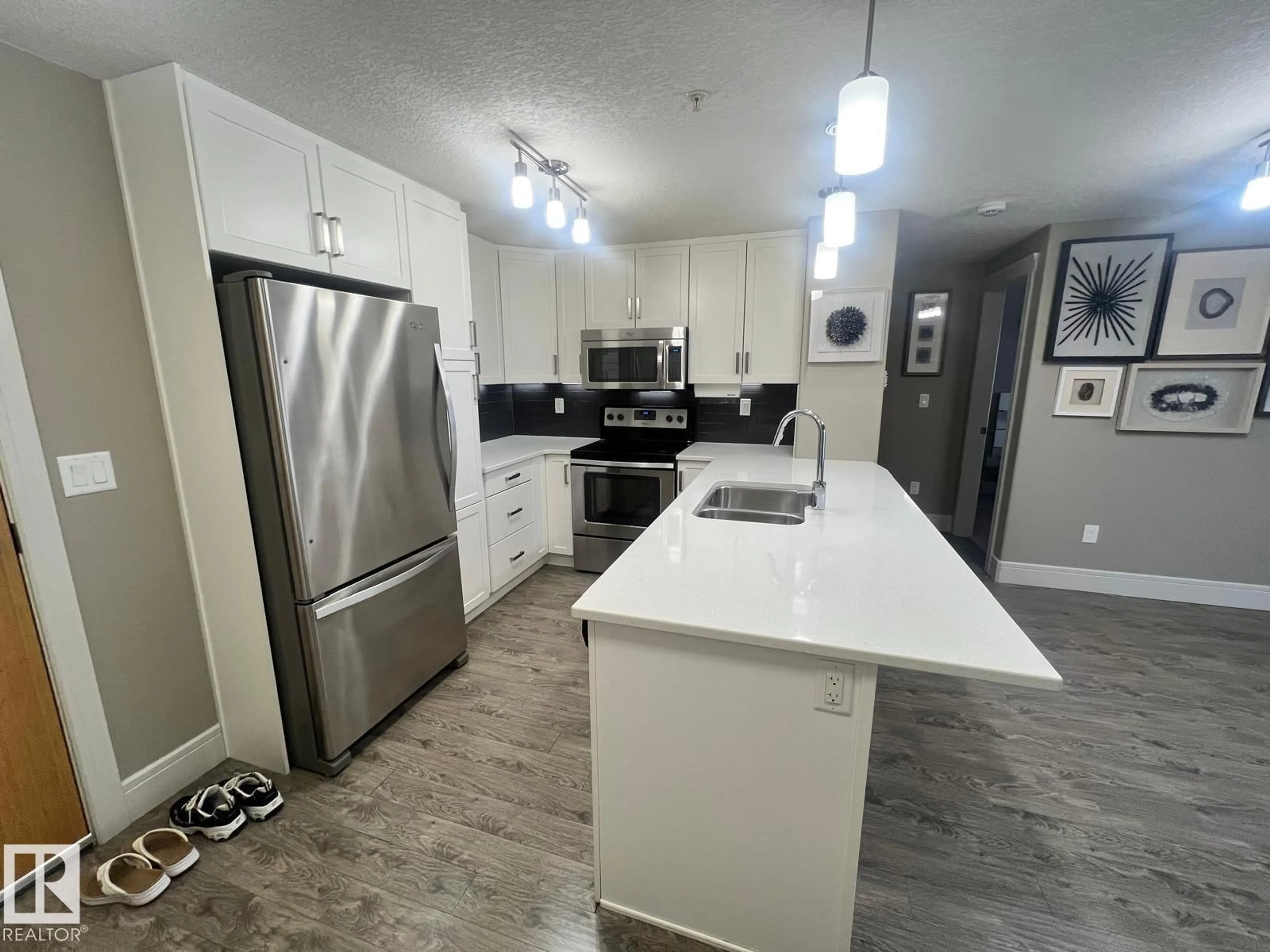 Open concept kitchen, unknown for #203 - 7508 GETTY GA, Edmonton Alberta T5T7E6
