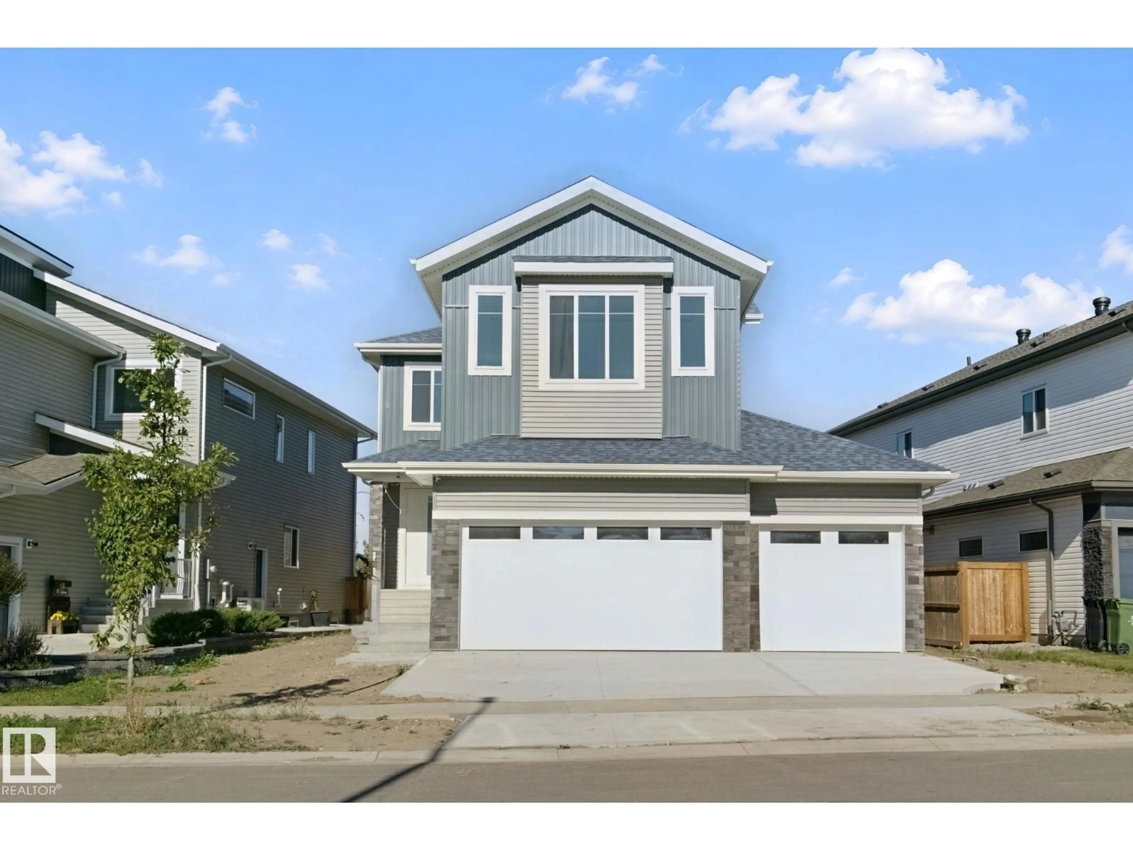 Home with vinyl exterior material, street for 357 MEADOWVIEW DR, Fort Saskatchewan Alberta T8L0X7