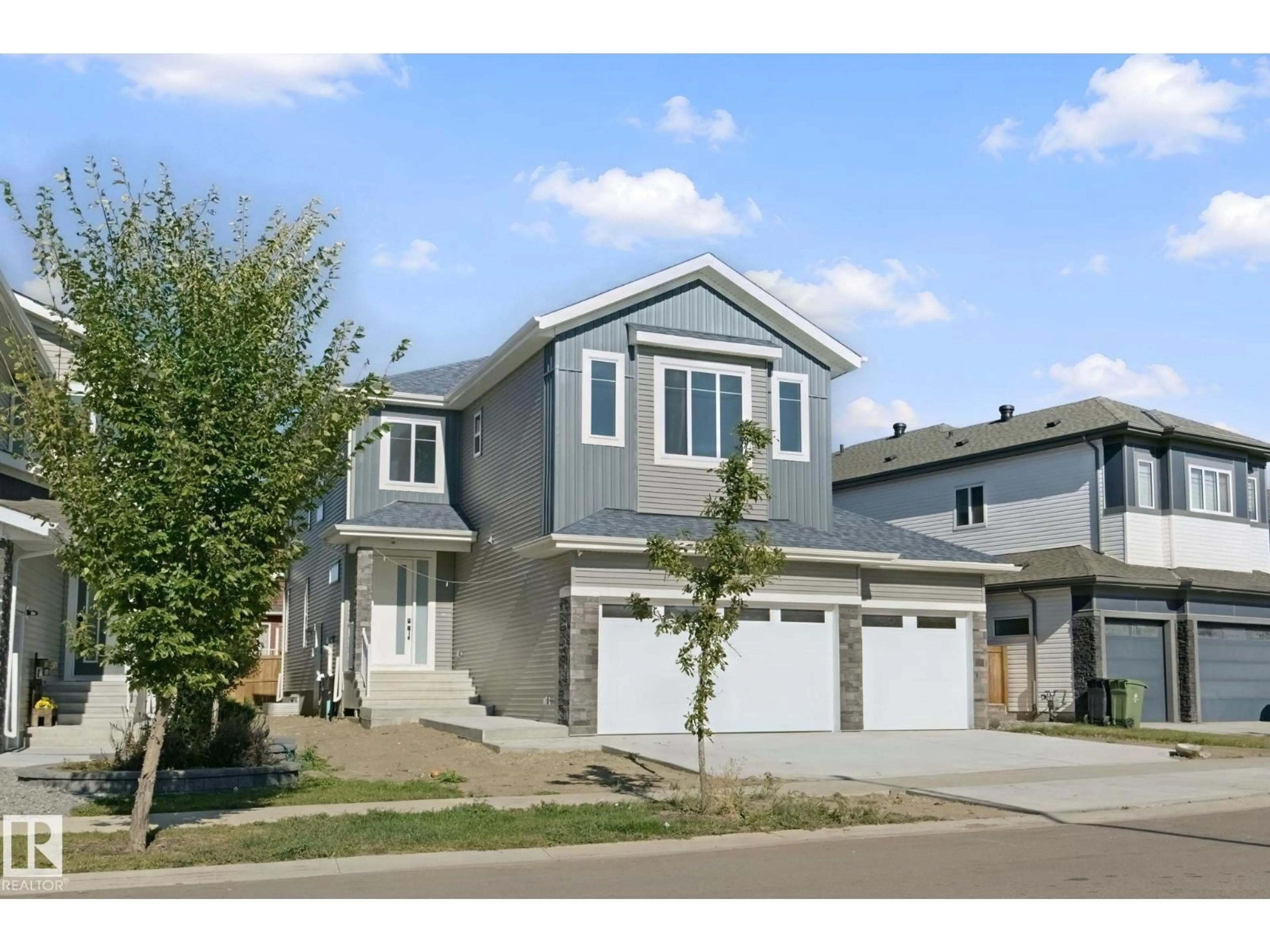 Home with vinyl exterior material, street for 357 MEADOWVIEW DR, Fort Saskatchewan Alberta T8L0X7