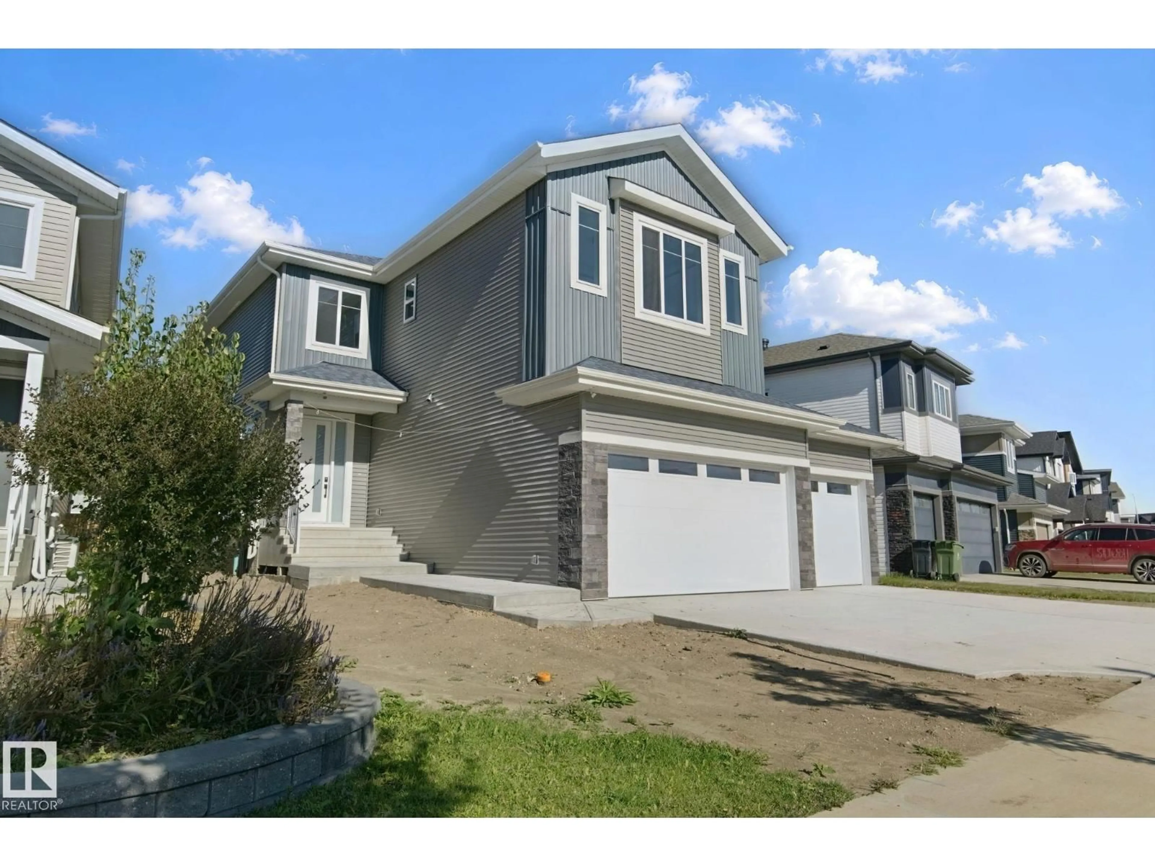 Home with vinyl exterior material, street for 357 MEADOWVIEW DR, Fort Saskatchewan Alberta T8L0X7