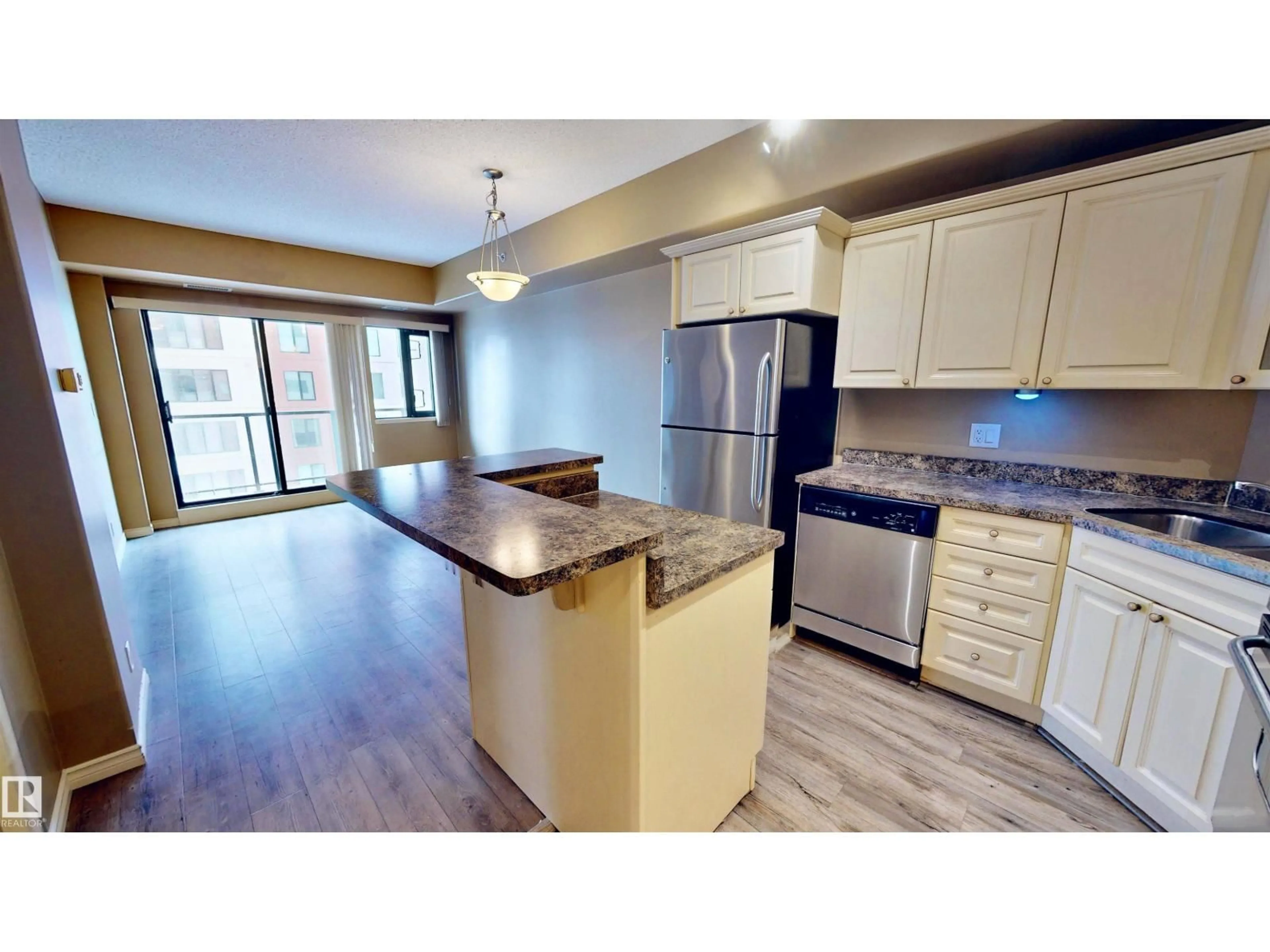 Open concept kitchen, wood/laminate floor for #503 - 10319 111 ST, Edmonton Alberta T5K0A2