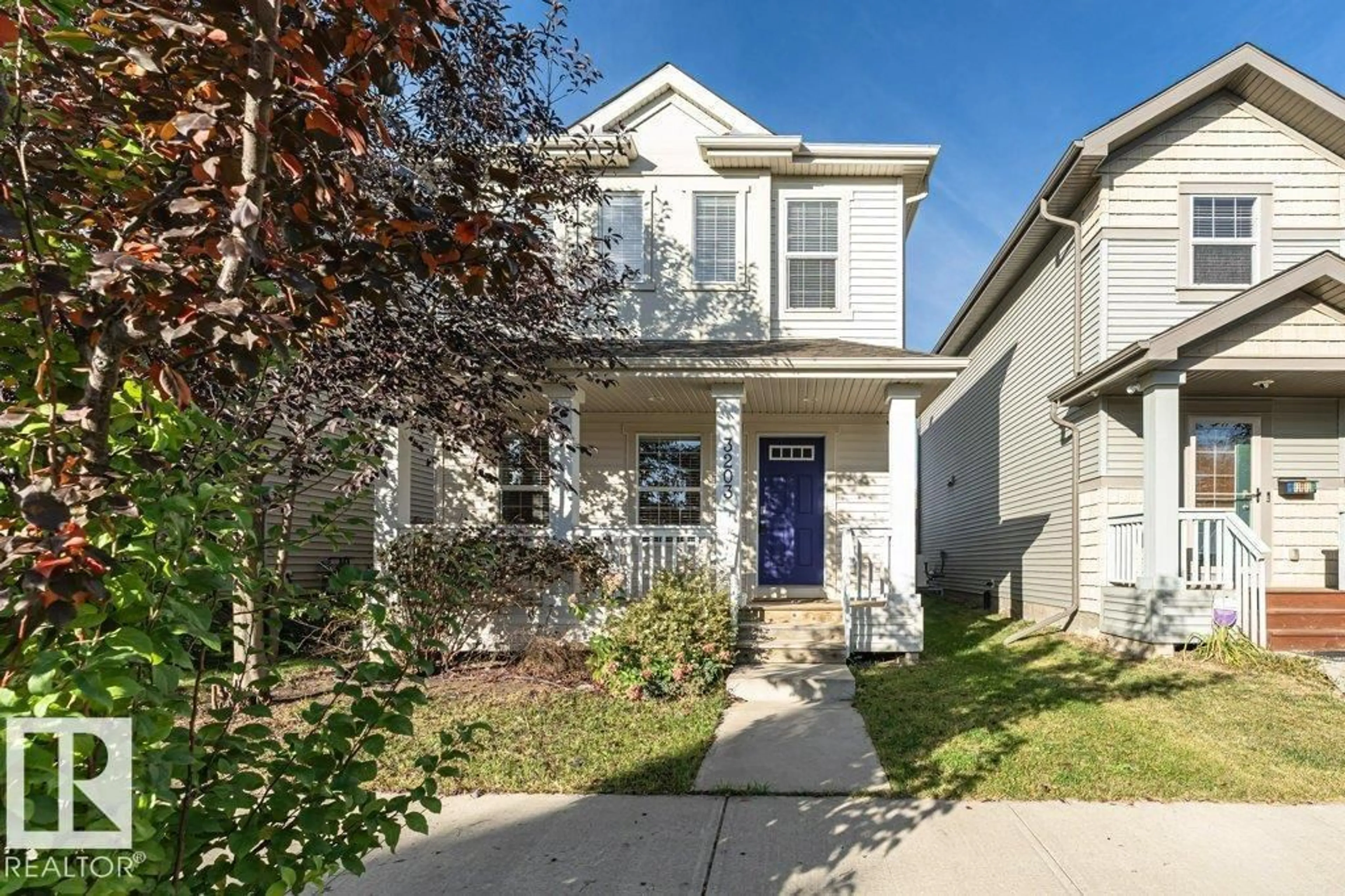 Home with vinyl exterior material, street for 3203 CARPENTER LANDING SW, Edmonton Alberta T6W2Y7