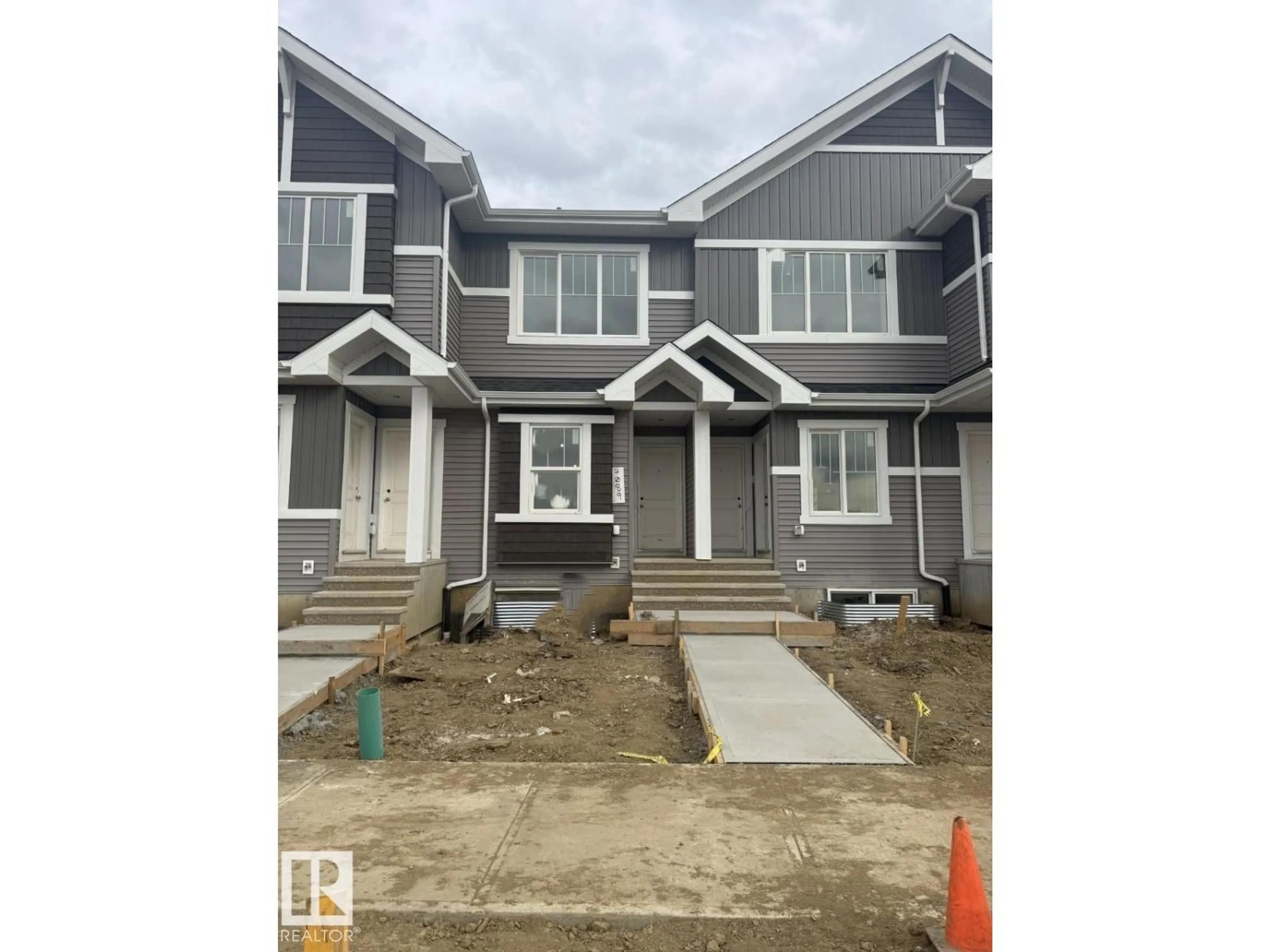 Home with vinyl exterior material, street for 7089 ROSENTHAL DR, Edmonton Alberta T5T7L4