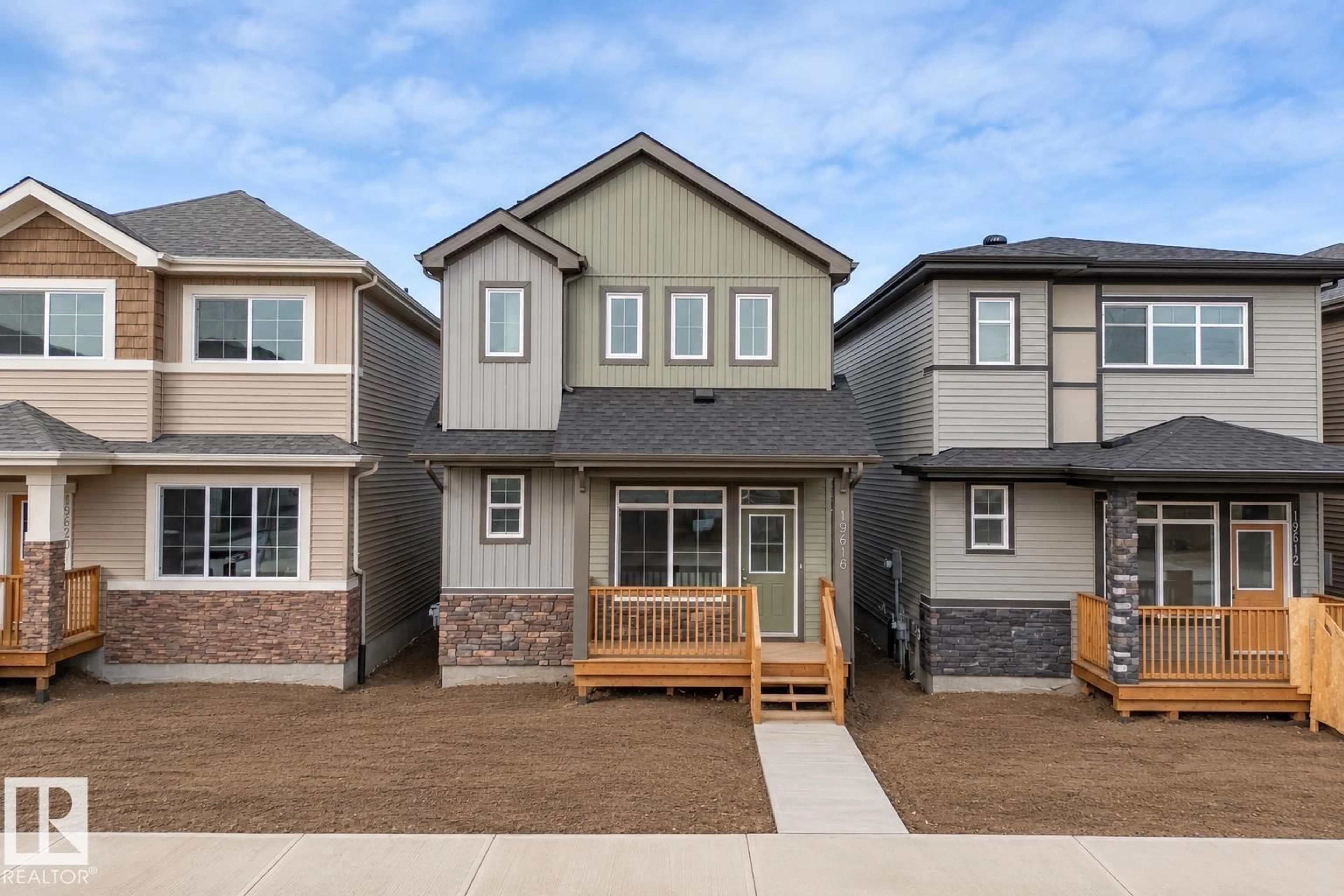 Home with vinyl exterior material, street for 19616 30 AVENUE AVENUE, Edmonton Alberta T6M3L9