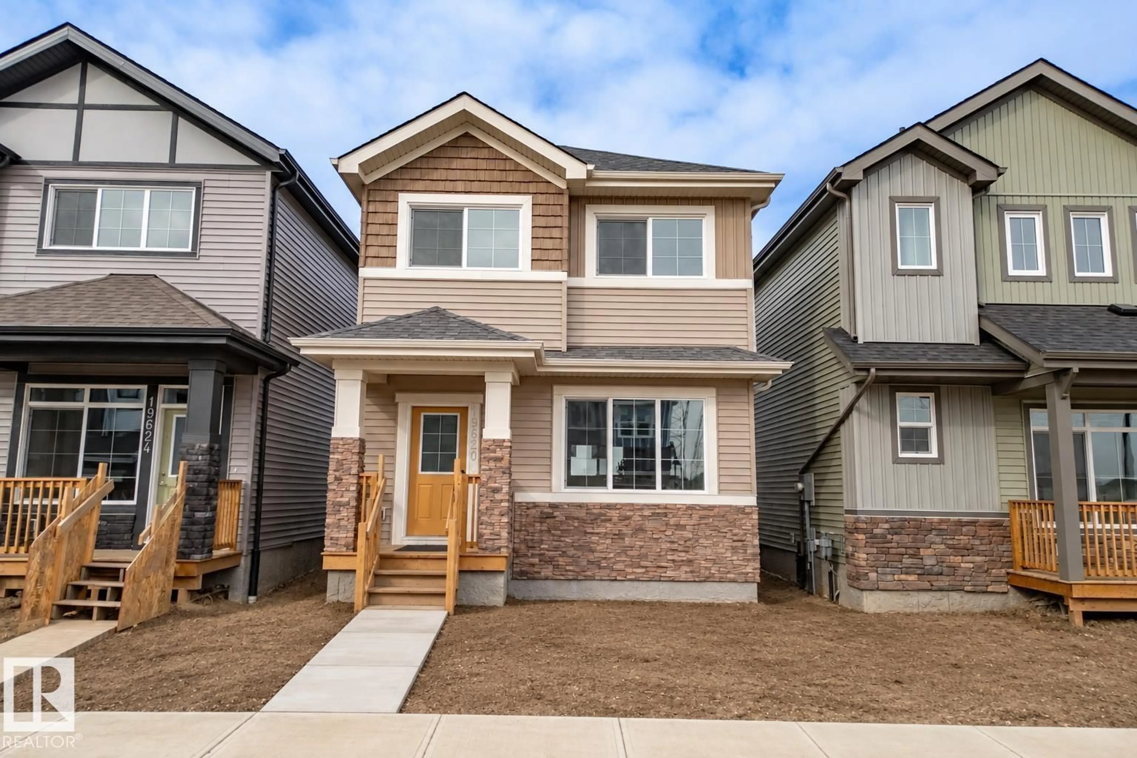 Home with vinyl exterior material, street for 19620 30 AVENUE AVENUE, Edmonton Alberta T6M3L9