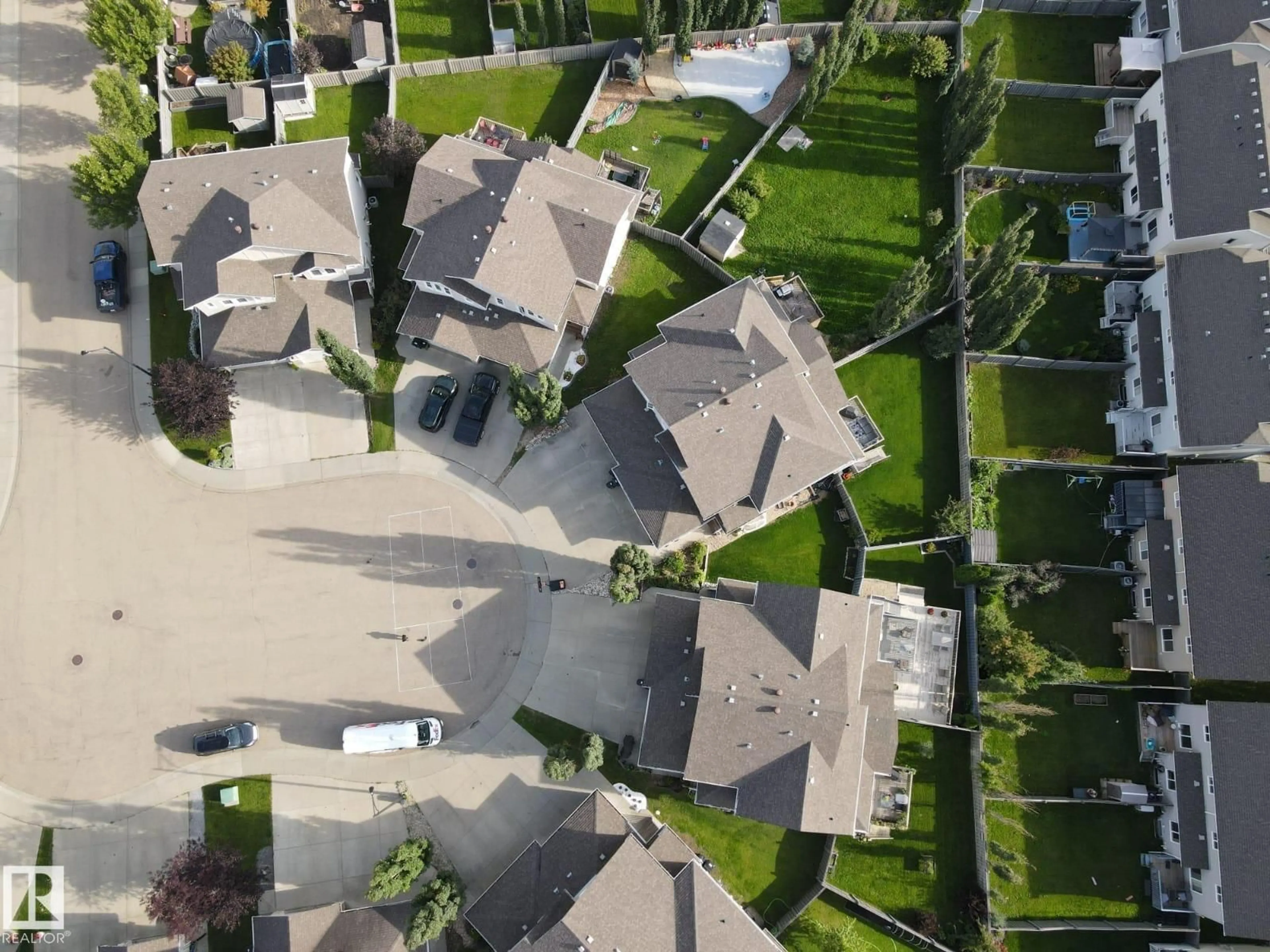 A pic from outside/outdoor area/front of a property/back of a property/a pic from drone, street for NW - 4904 214 ST, Edmonton Alberta T6M0K6