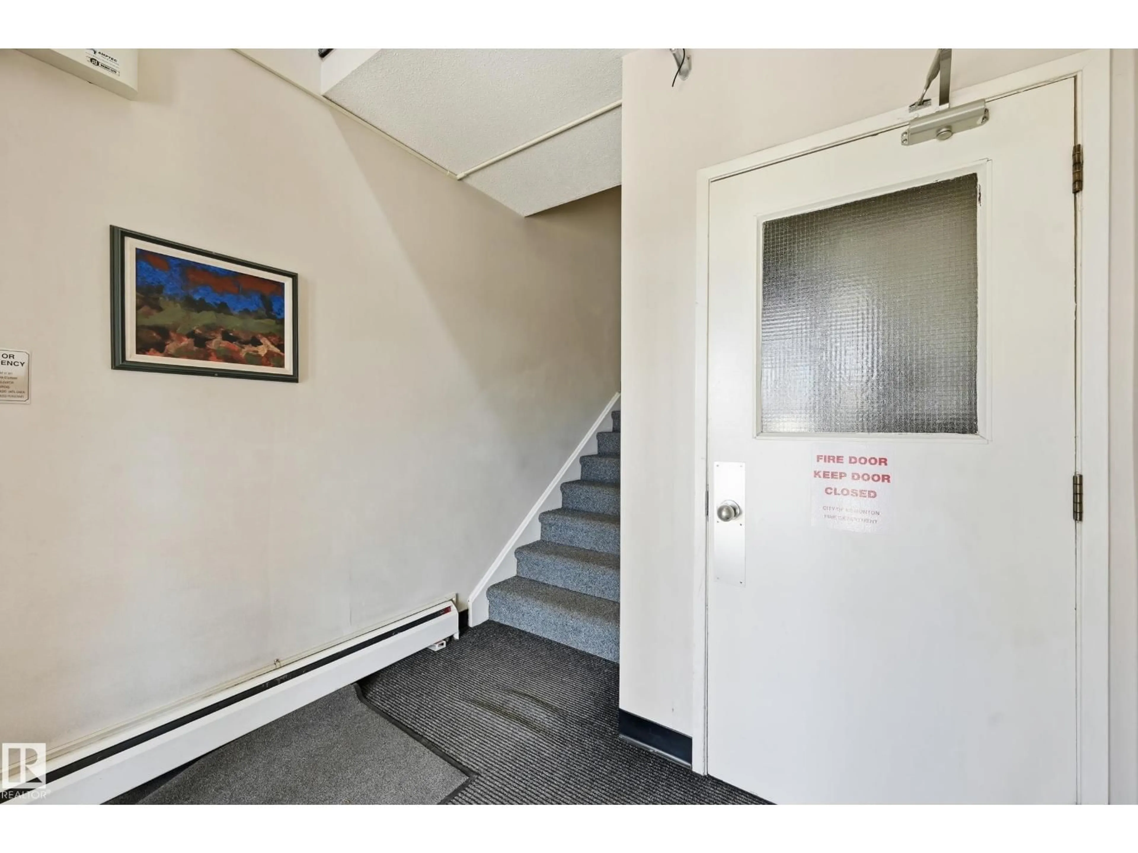 Indoor foyer for #305 - 10811 115 ST, Edmonton Alberta T5H3L2