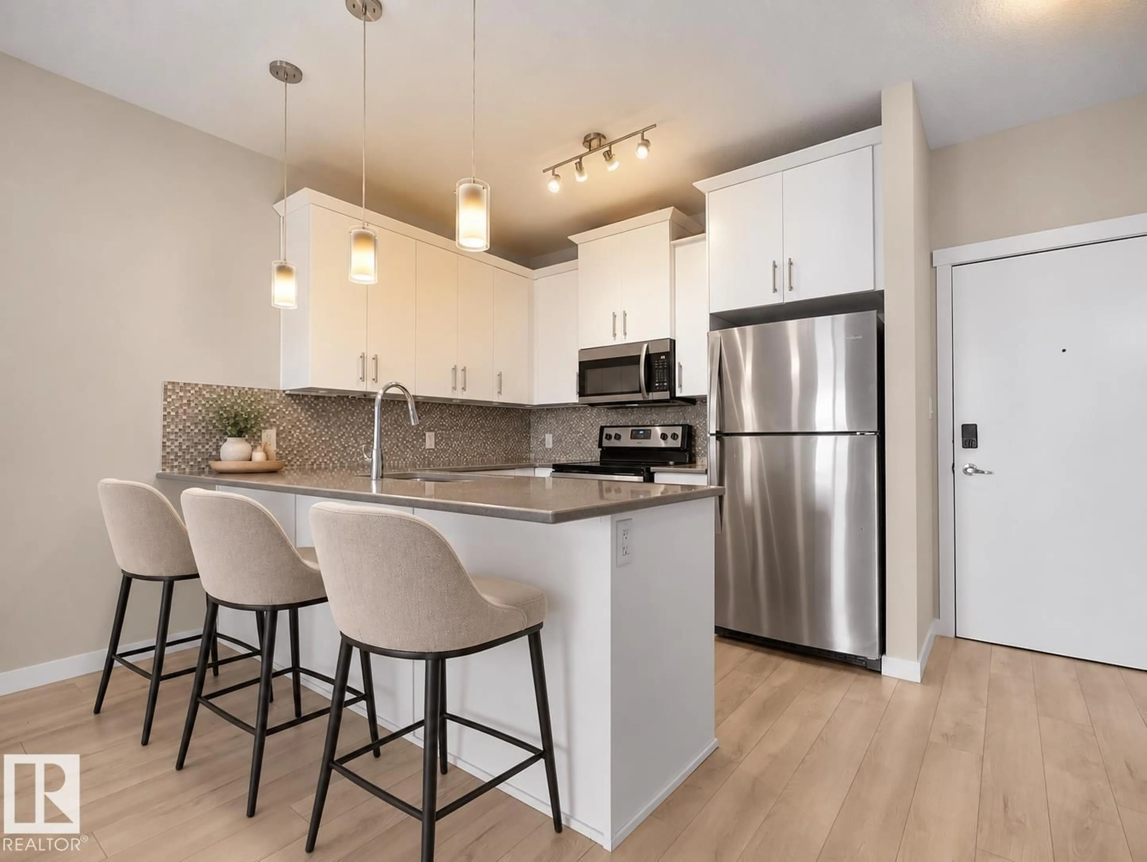 Open concept kitchen, wood/laminate floor for #304 - 812 WELSH DR, Edmonton Alberta T6X1Y7