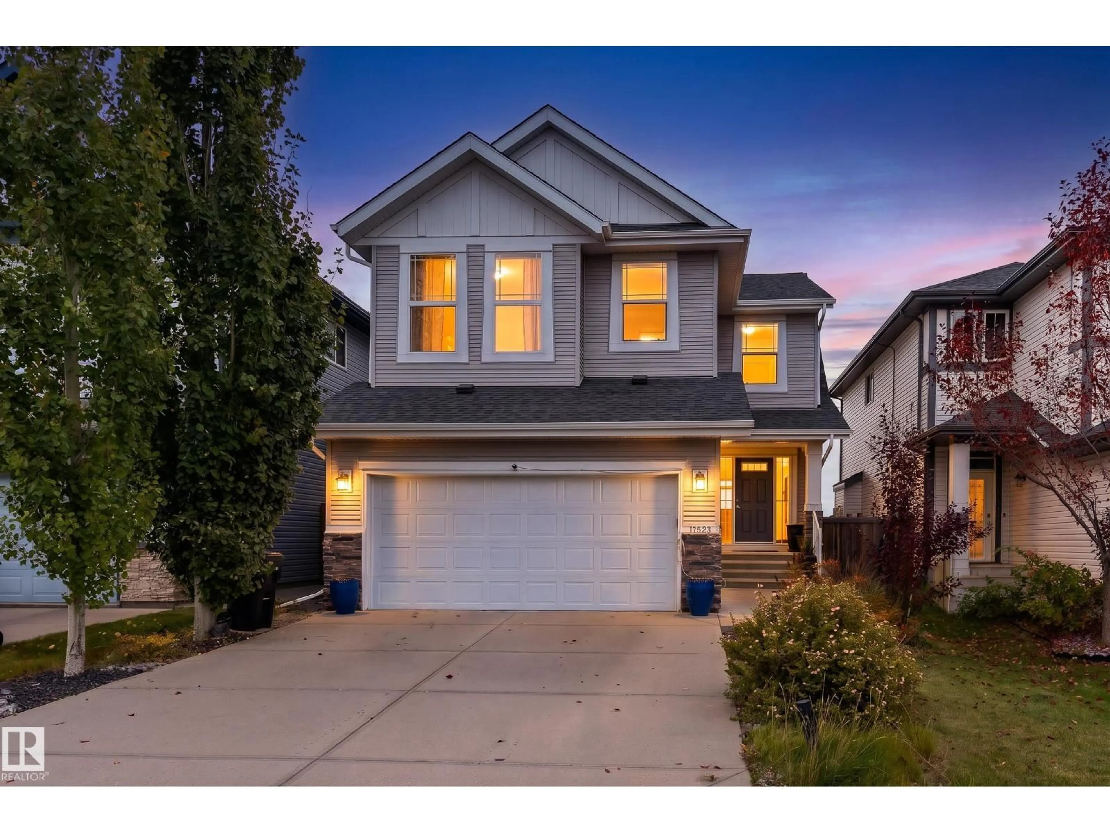 Home with vinyl exterior material, street for NW - 17523 56 ST, Edmonton Alberta T5Y0T6