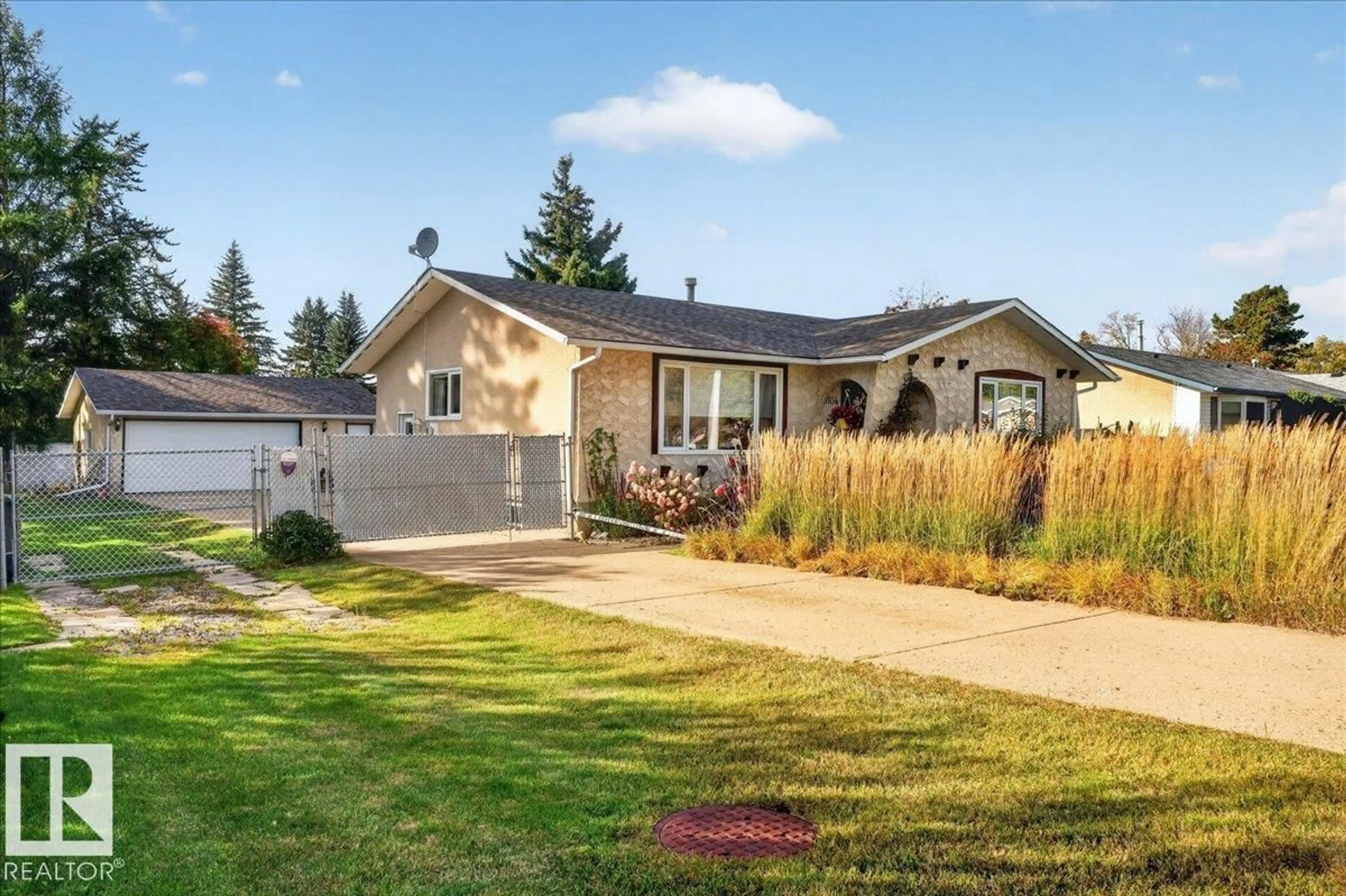 Home with vinyl exterior material, street for 5104 53 ST, Bon Accord Alberta T0A0K0