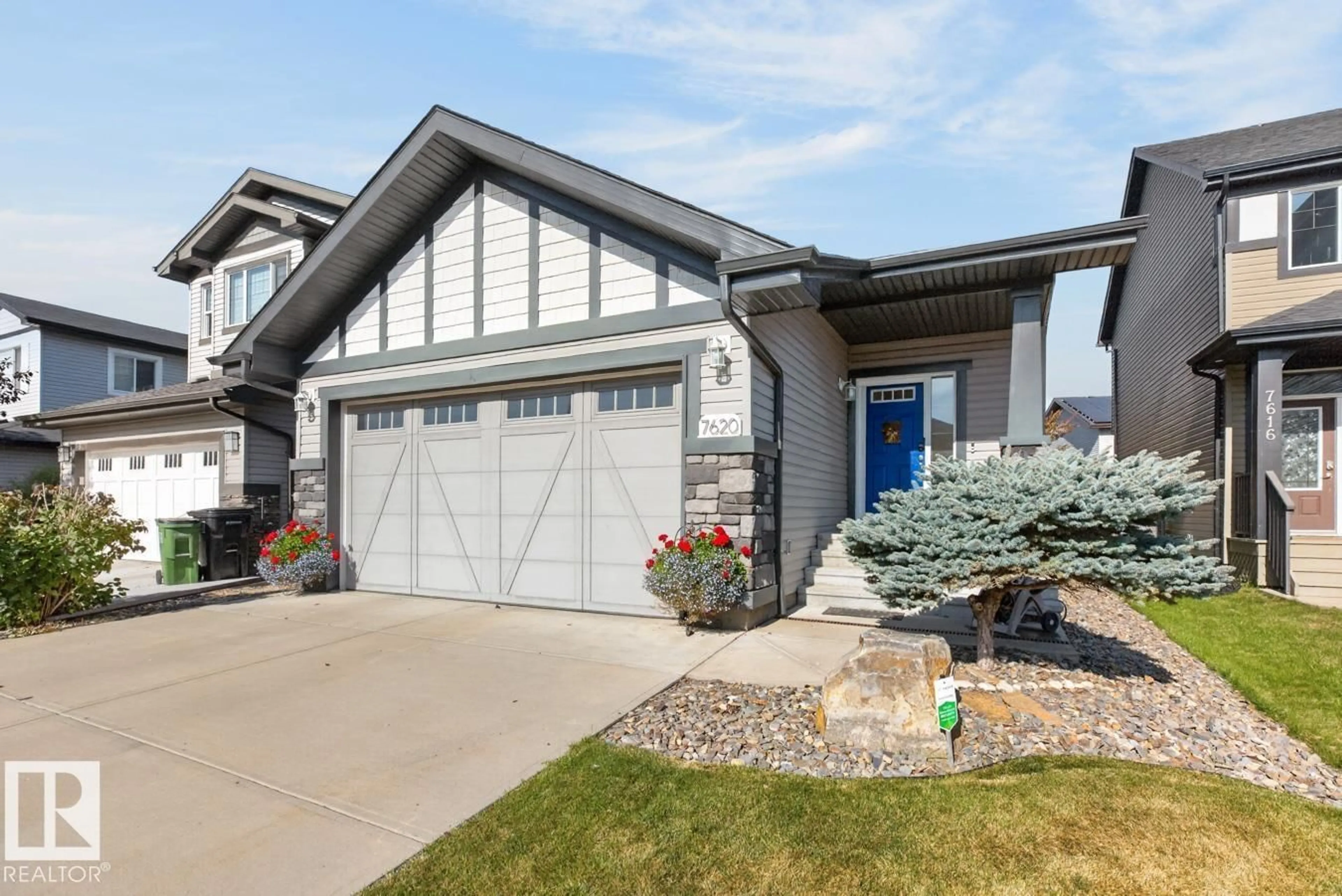 Home with vinyl exterior material, street for NW - 7620 179 AV, Edmonton Alberta T5Z0L2