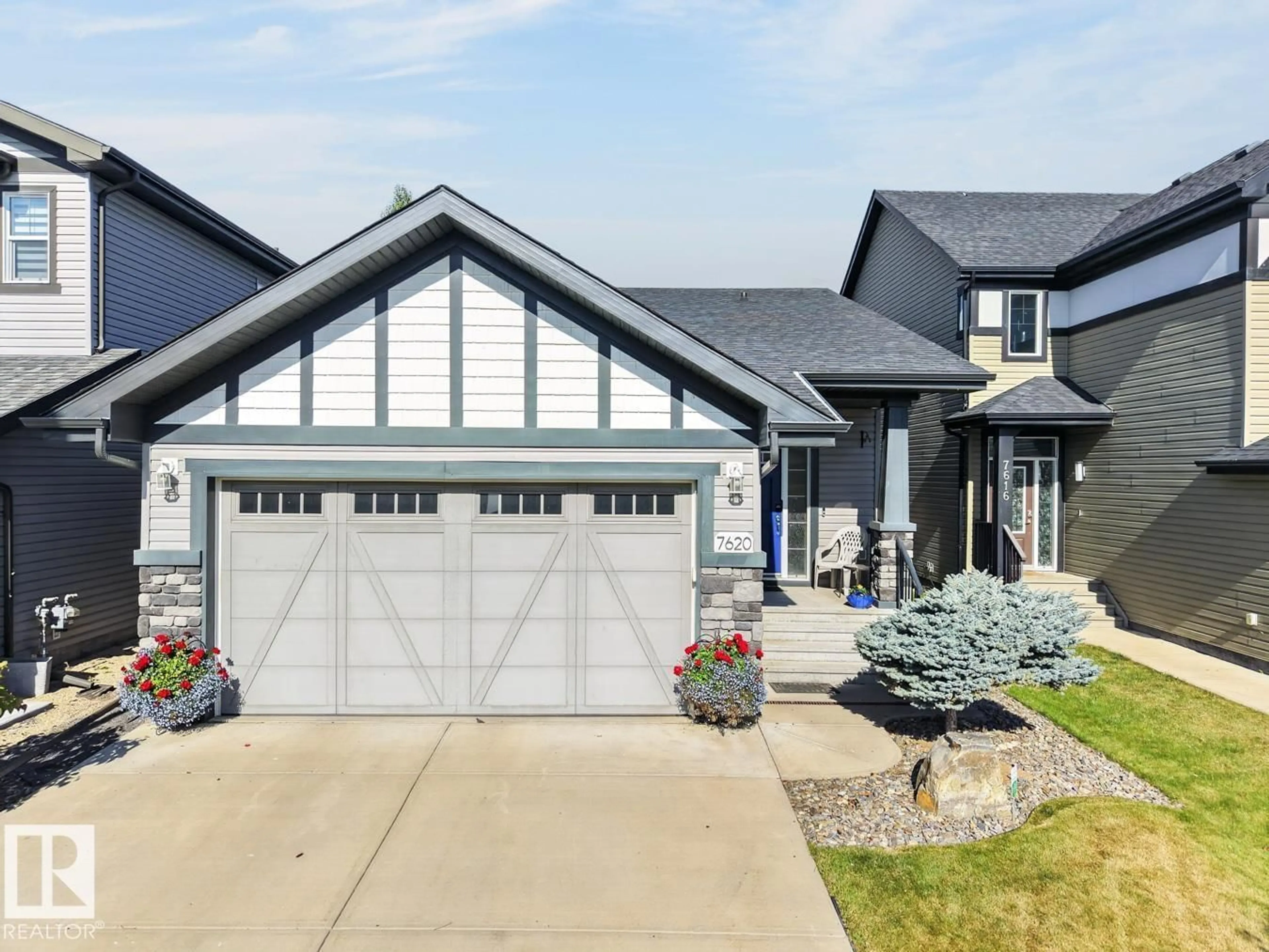 Home with vinyl exterior material, street for NW - 7620 179 AV, Edmonton Alberta T5Z0L2