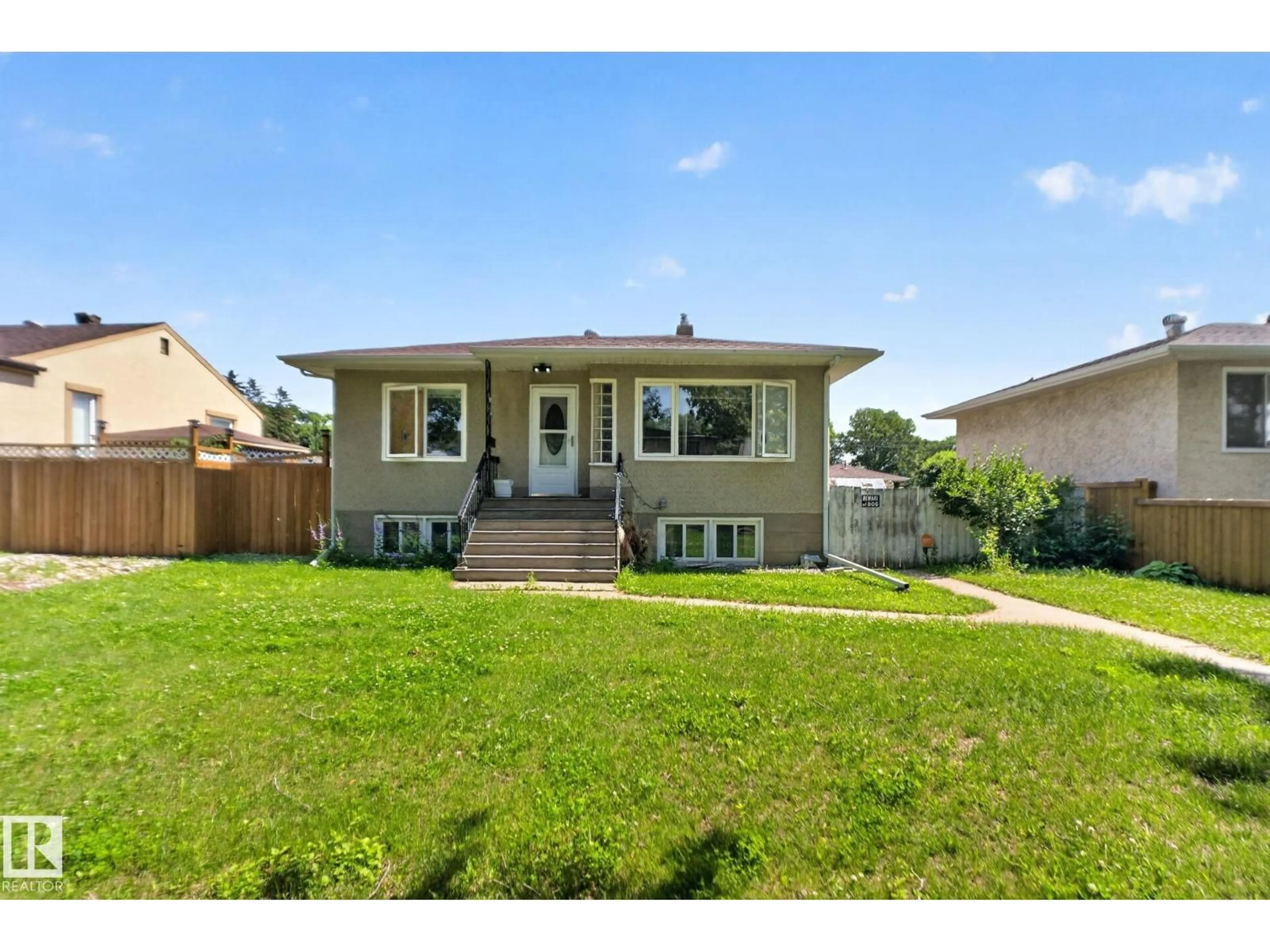 Home with vinyl exterior material, street for NW - 12229 88 ST, Edmonton Alberta T5B3S7