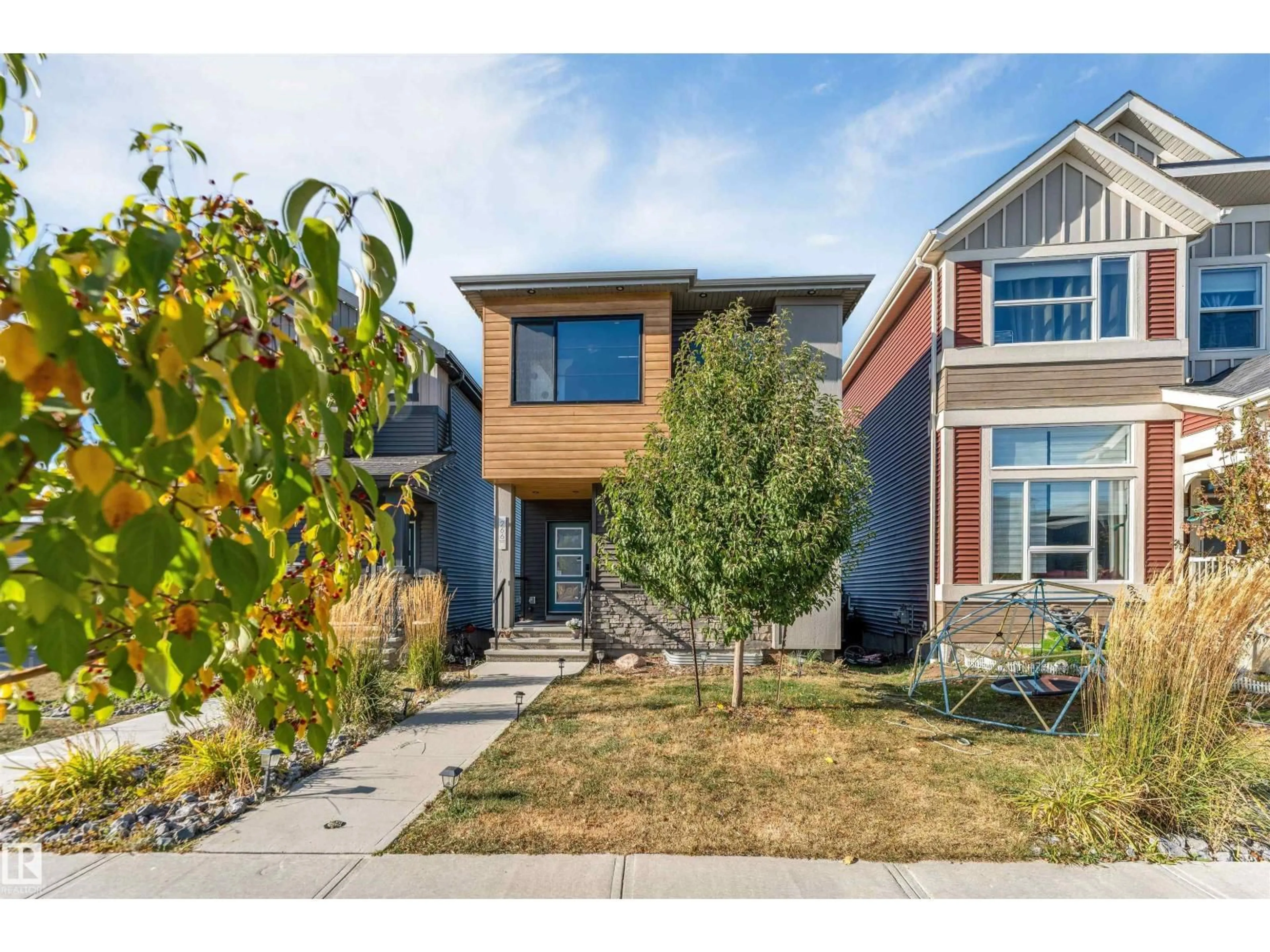 Home with brick exterior material, street for 266 CHARLESWORTH DR, Edmonton Alberta T6X2P4