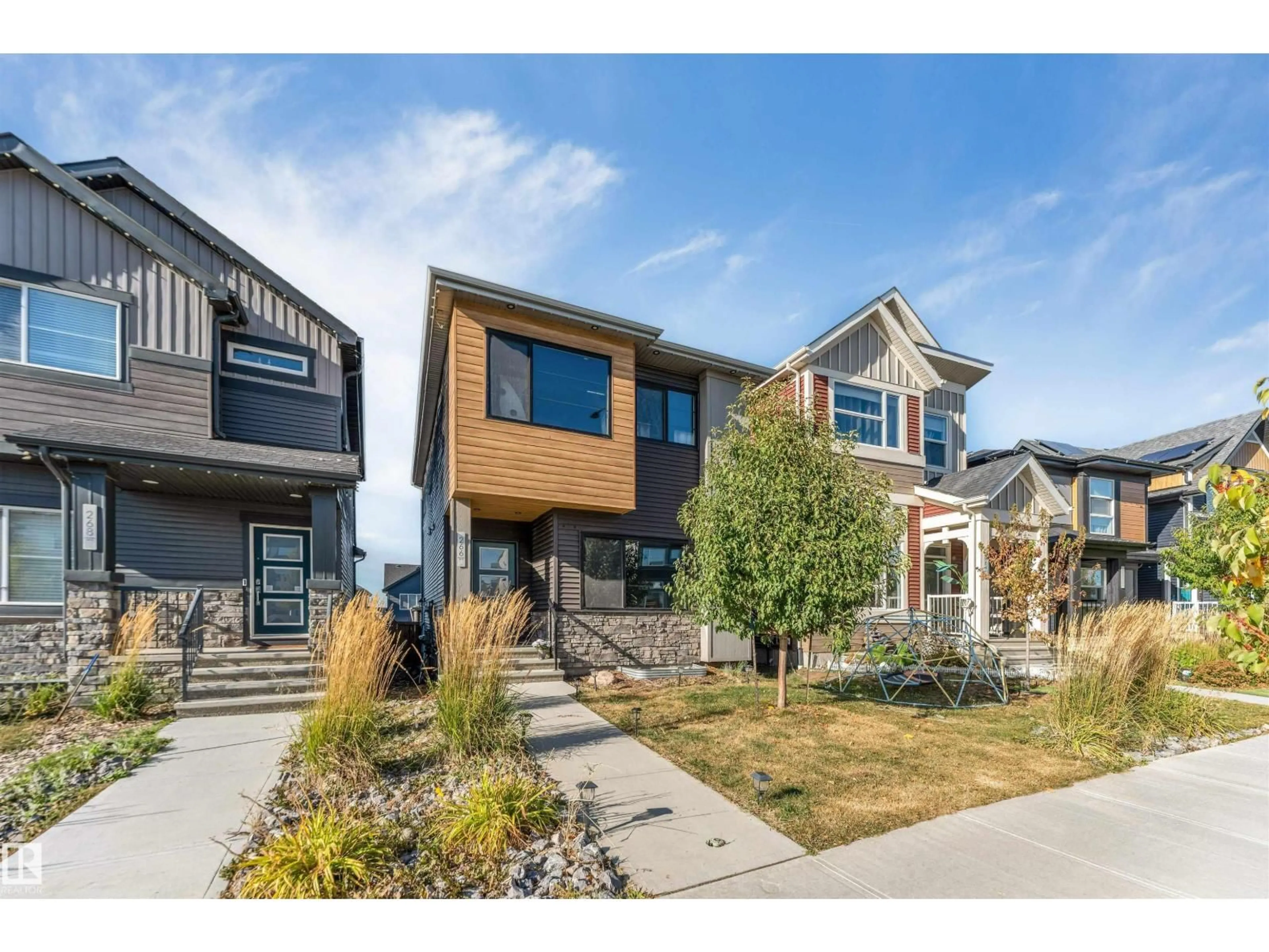 Home with brick exterior material, street for 266 CHARLESWORTH DR, Edmonton Alberta T6X2P4
