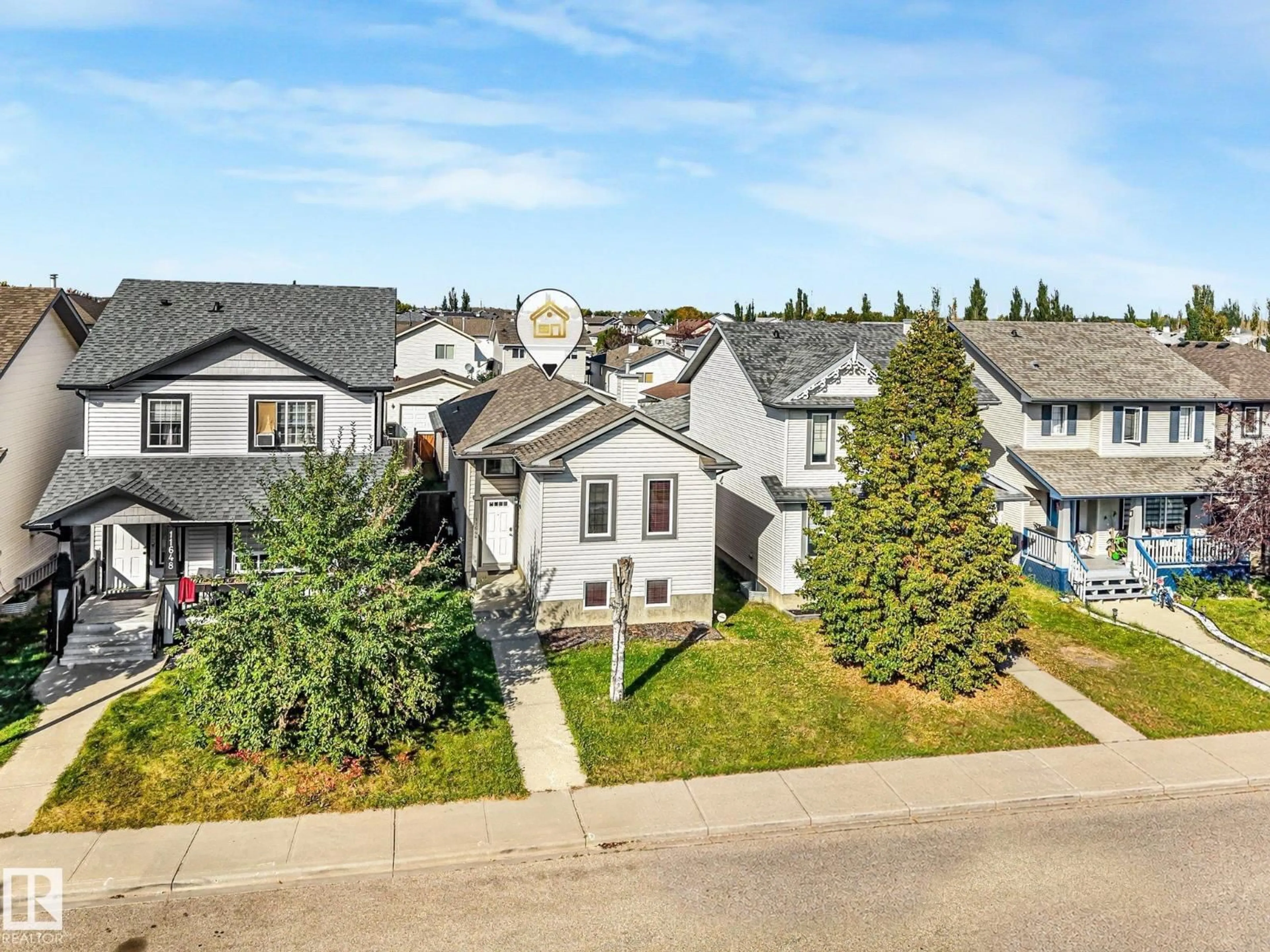 A pic from outside/outdoor area/front of a property/back of a property/a pic from drone, street for 11644 167A AV, Edmonton Alberta T5X6J5