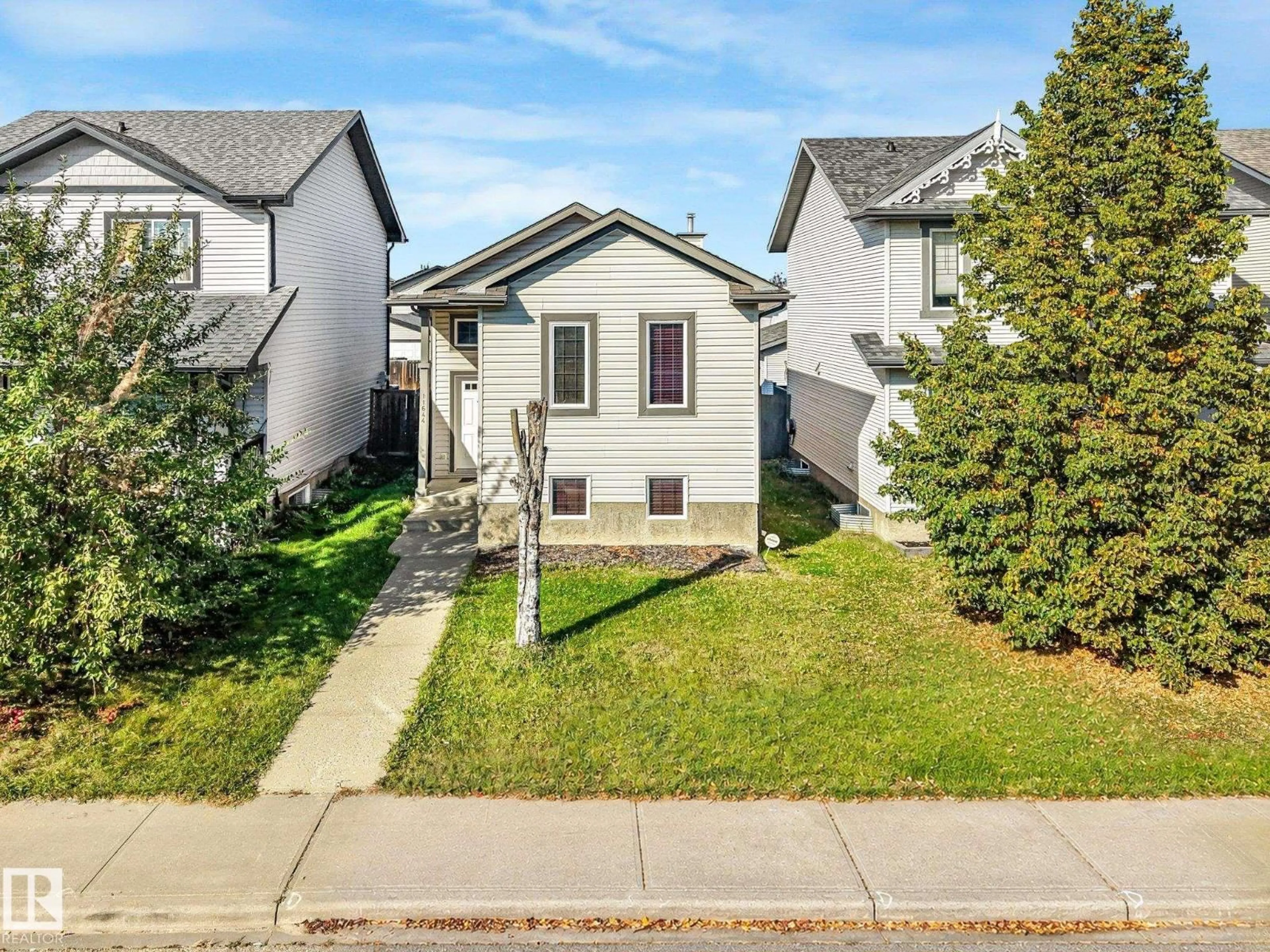 Home with vinyl exterior material, street for 11644 167A AV, Edmonton Alberta T5X6J5