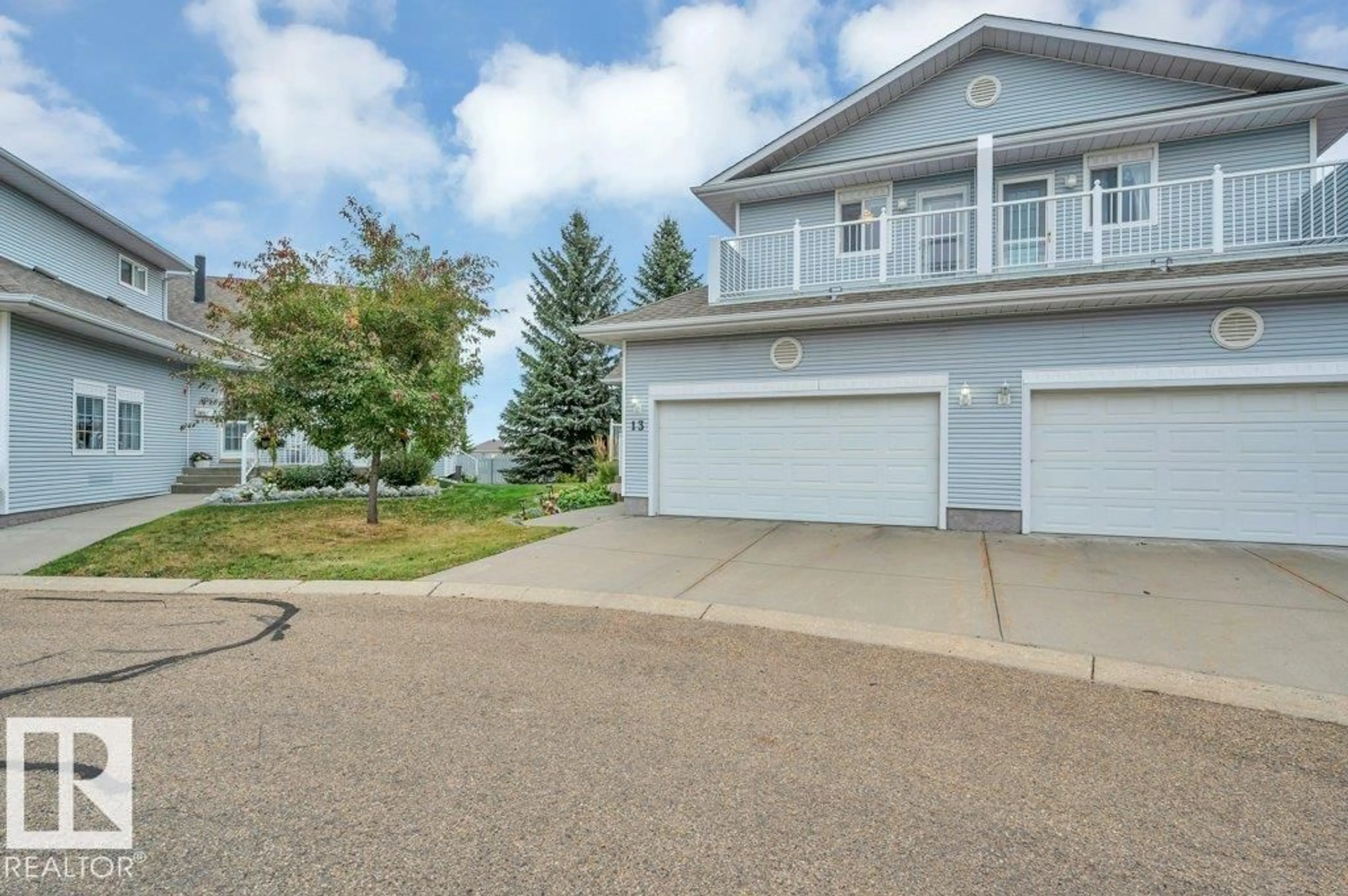 A pic from outside/outdoor area/front of a property/back of a property/a pic from drone, street for 65 - 13 CRANFORD DR, Sherwood Park Alberta T8H1W5