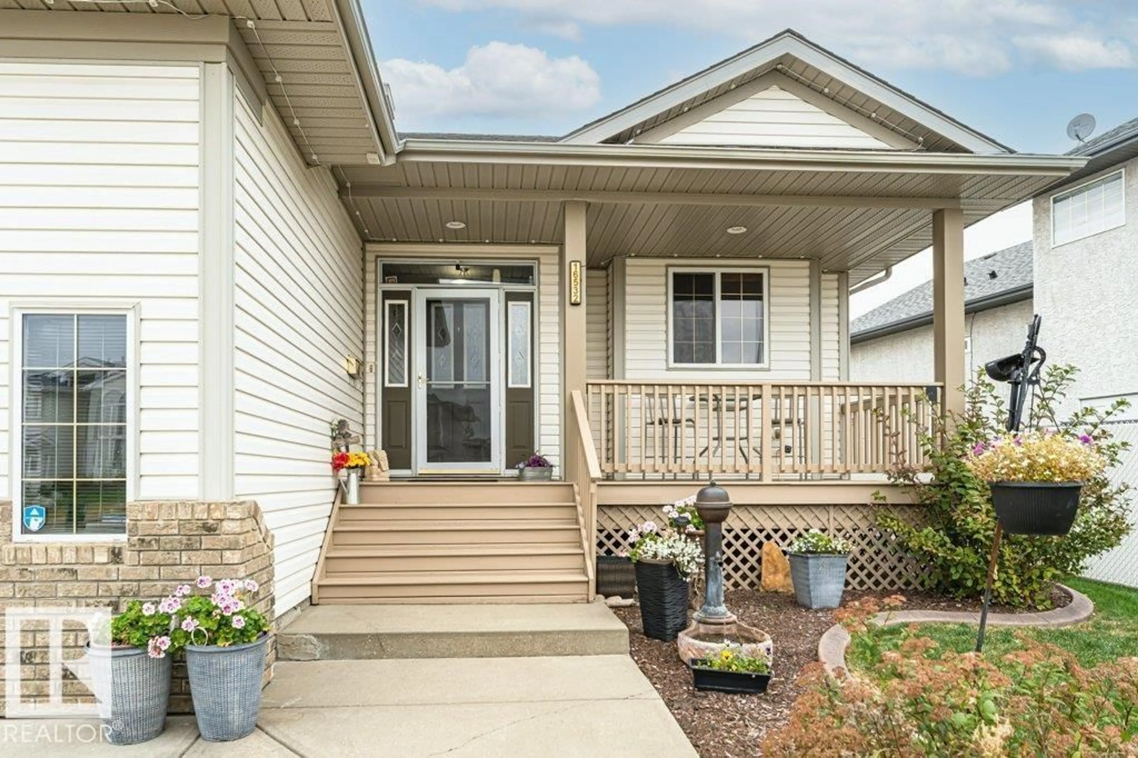Home with vinyl exterior material, street for 16532 75 ST, Edmonton Alberta T5Z3R1