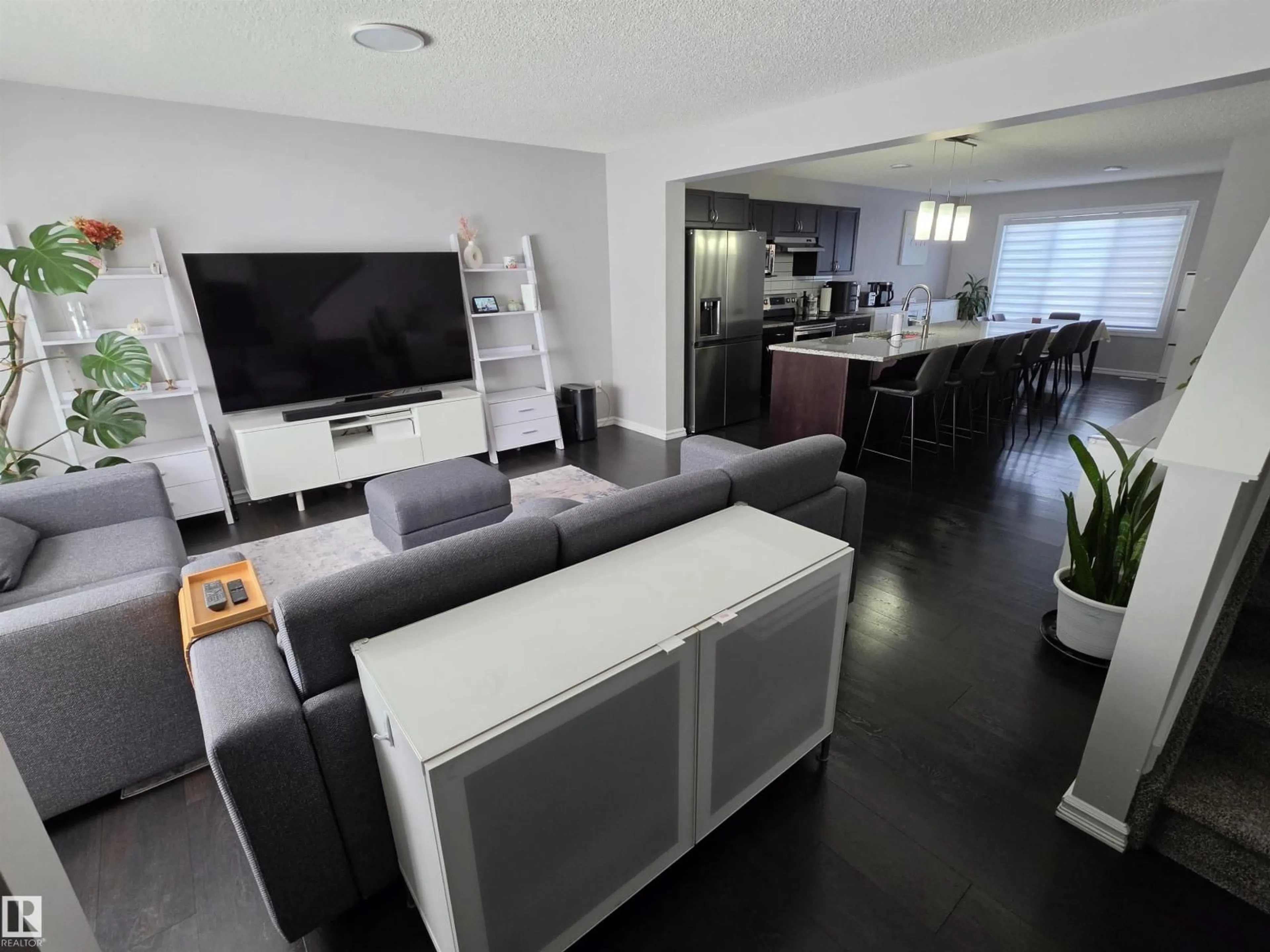 Living room with furniture, unknown for 2508 20 AV, Edmonton Alberta T6T0Y7