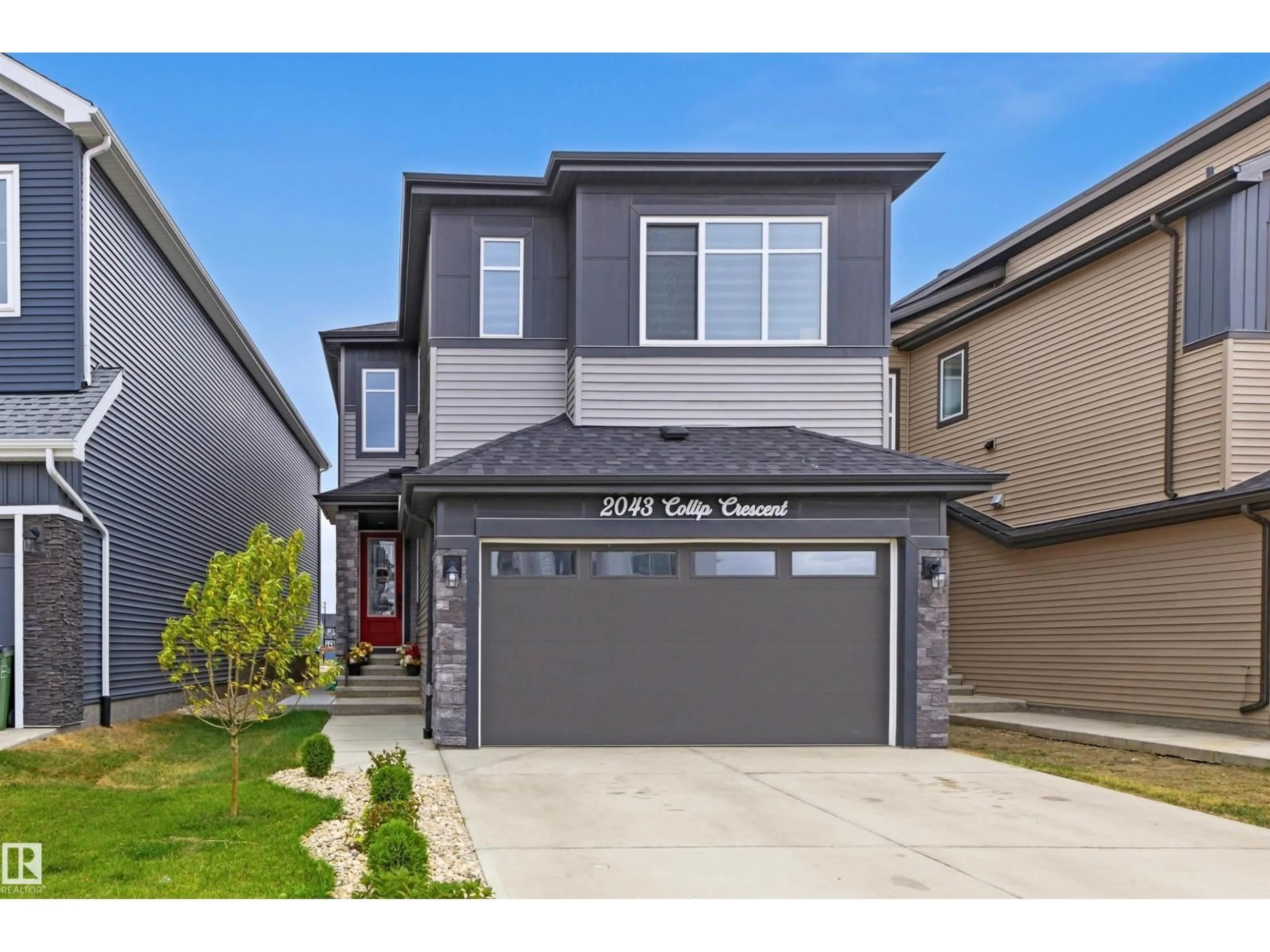 Home with vinyl exterior material, street for SW - 2043 COLLIP CR, Edmonton Alberta T6W5T4