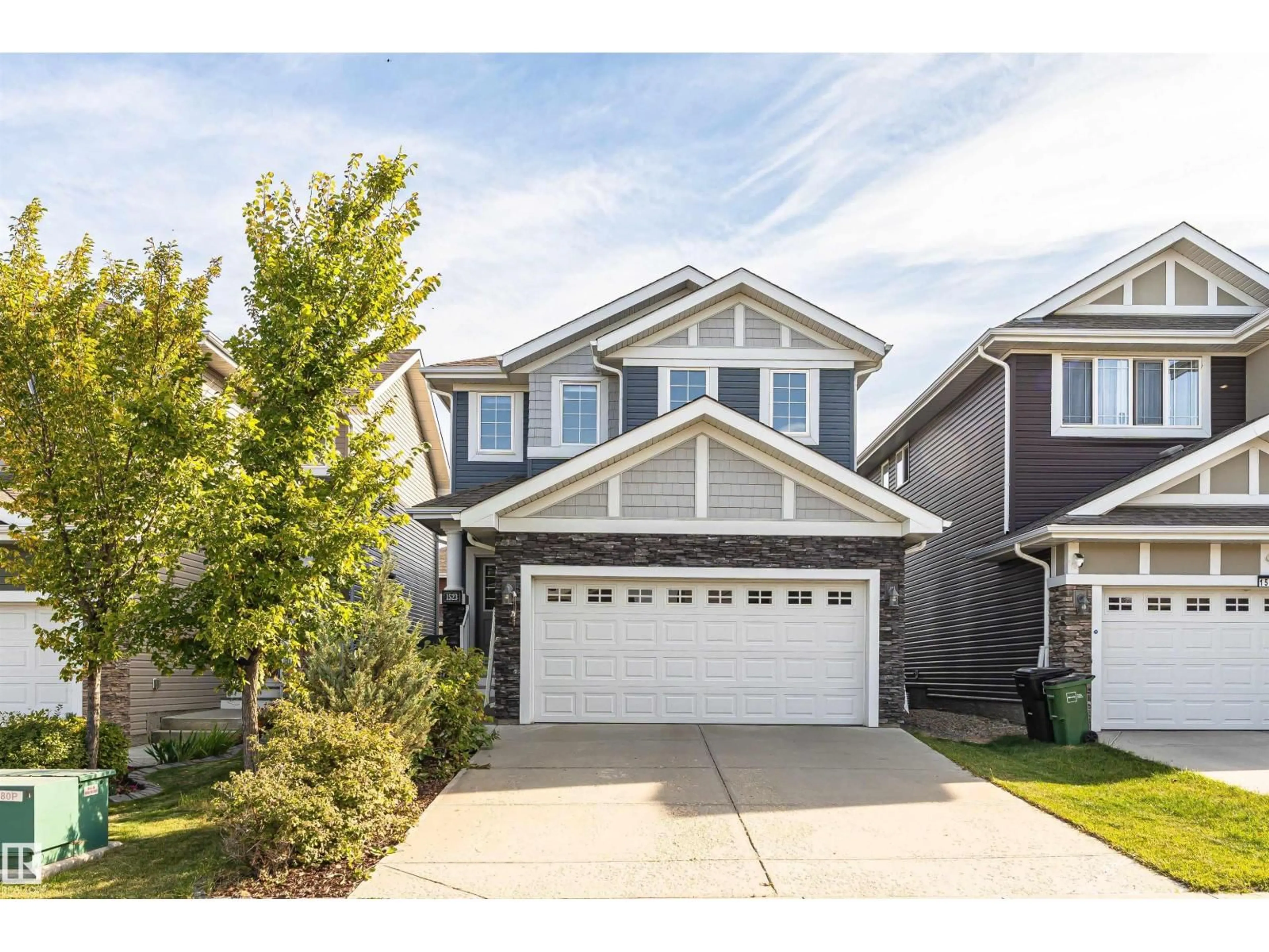 Home with vinyl exterior material, street for SW - 1523 169 ST, Edmonton Alberta T6W1H2