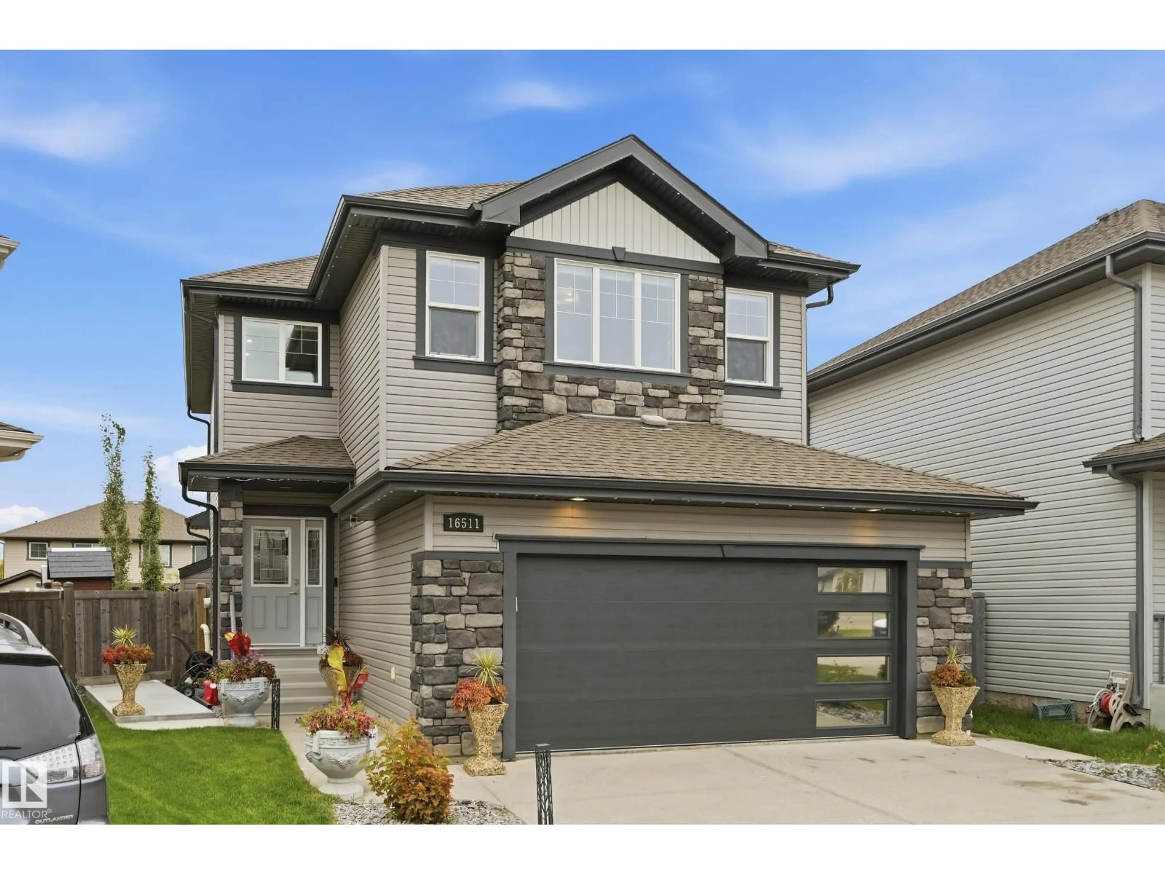Home with brick exterior material, street for NW - 16511 136 ST, Edmonton Alberta T6V0G8