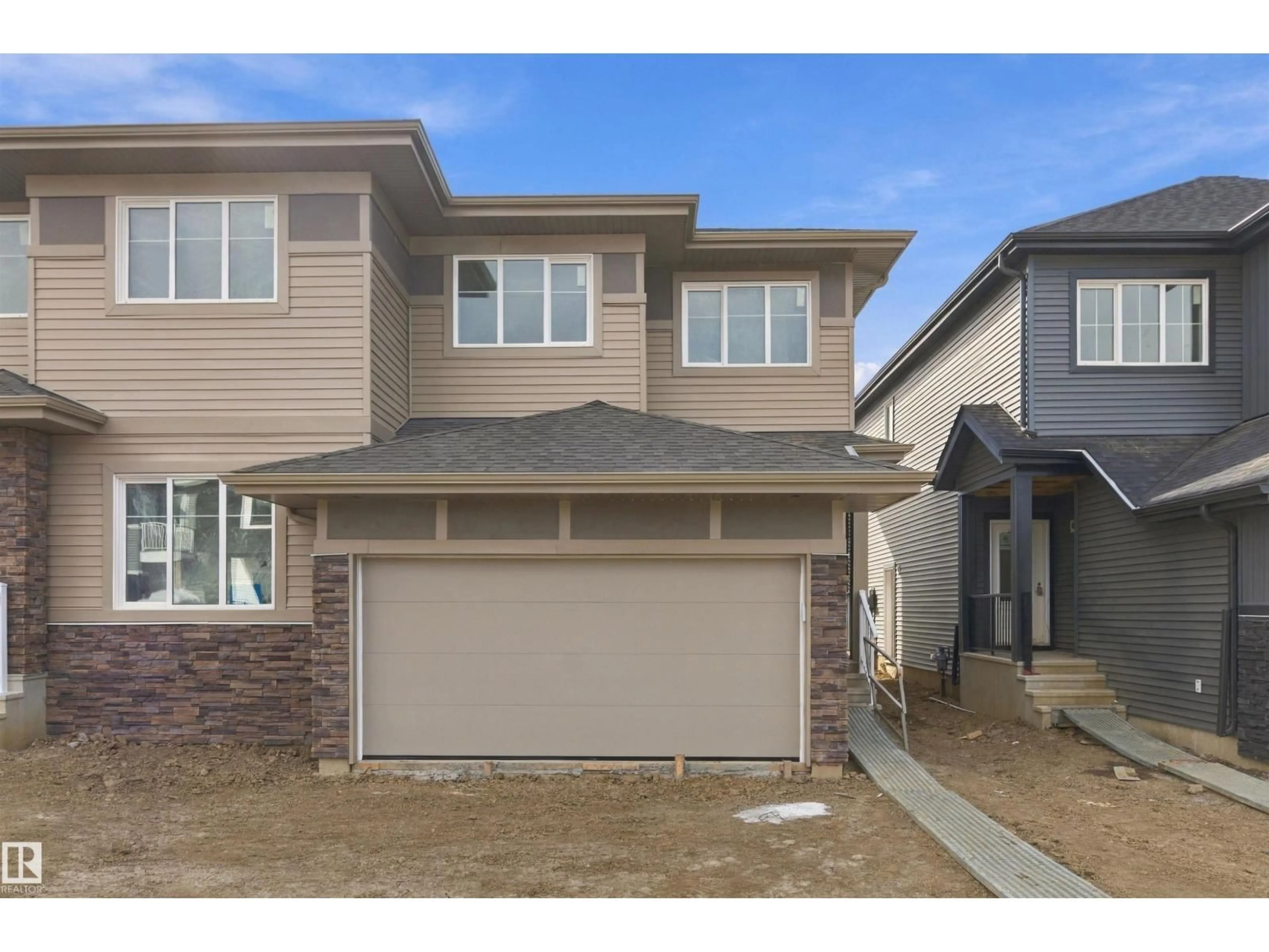 Home with vinyl exterior material, street for 7 WORWYCK CM, Spruce Grove Alberta T7X3G5