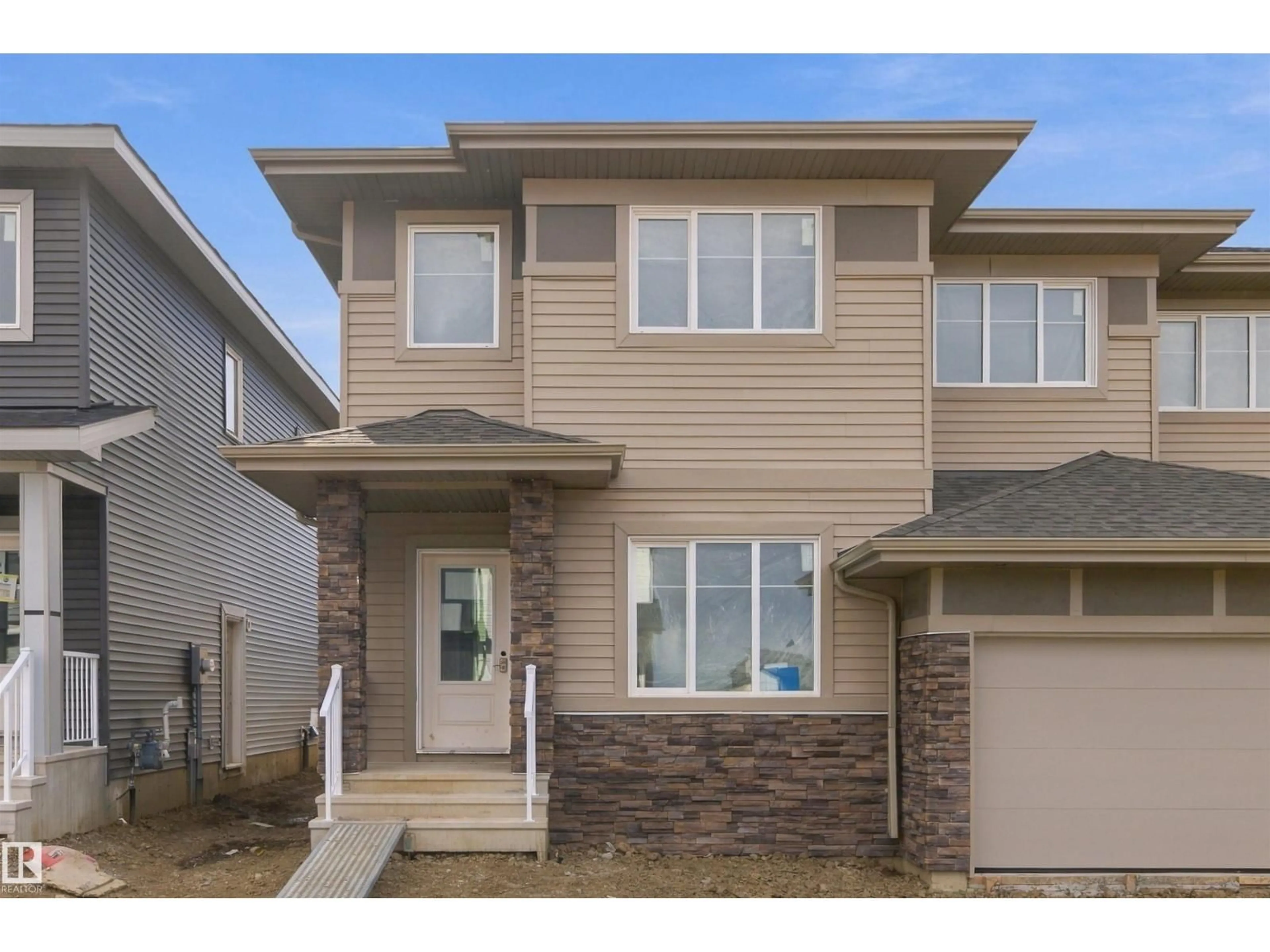Home with vinyl exterior material, street for 9 WORWYCK CM, Spruce Grove Alberta T7X4E1