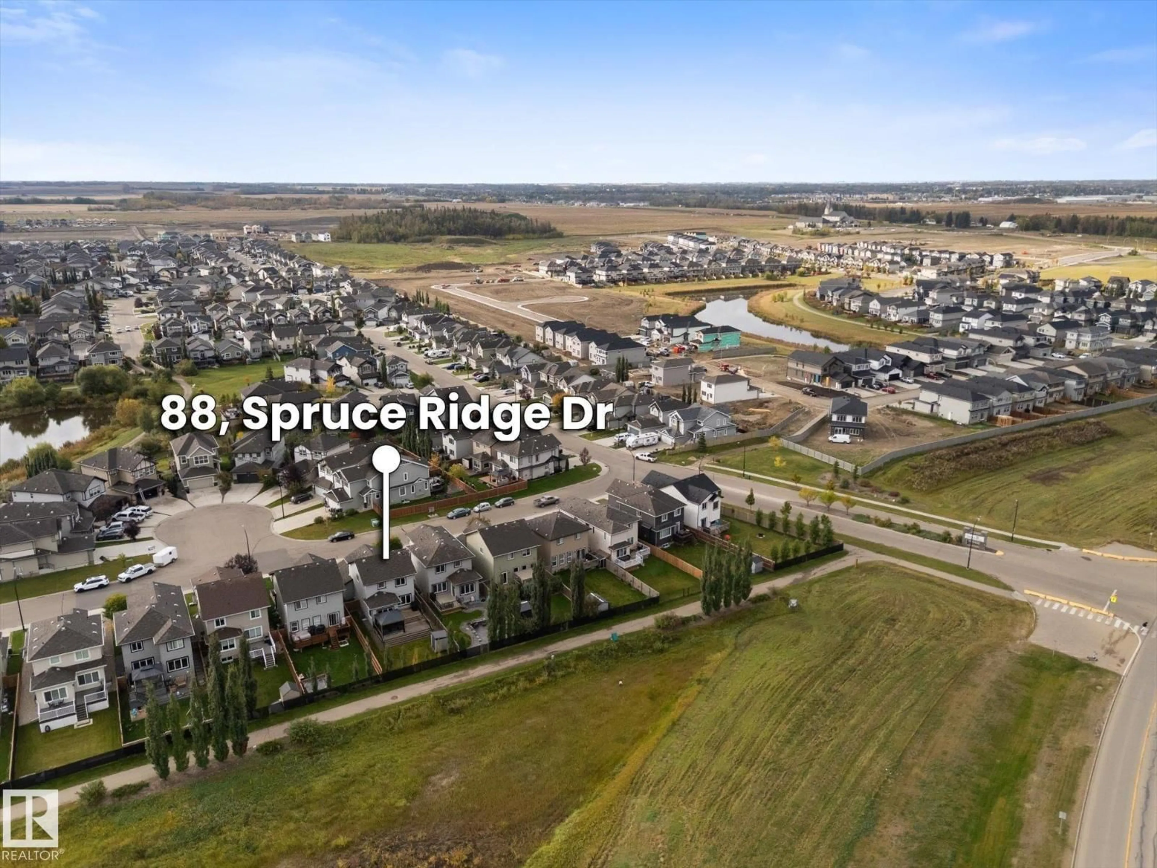 A pic from outside/outdoor area/front of a property/back of a property/a pic from drone, street for 88 SPRUCE RIDGE DR, Spruce Grove Alberta T7X0S5