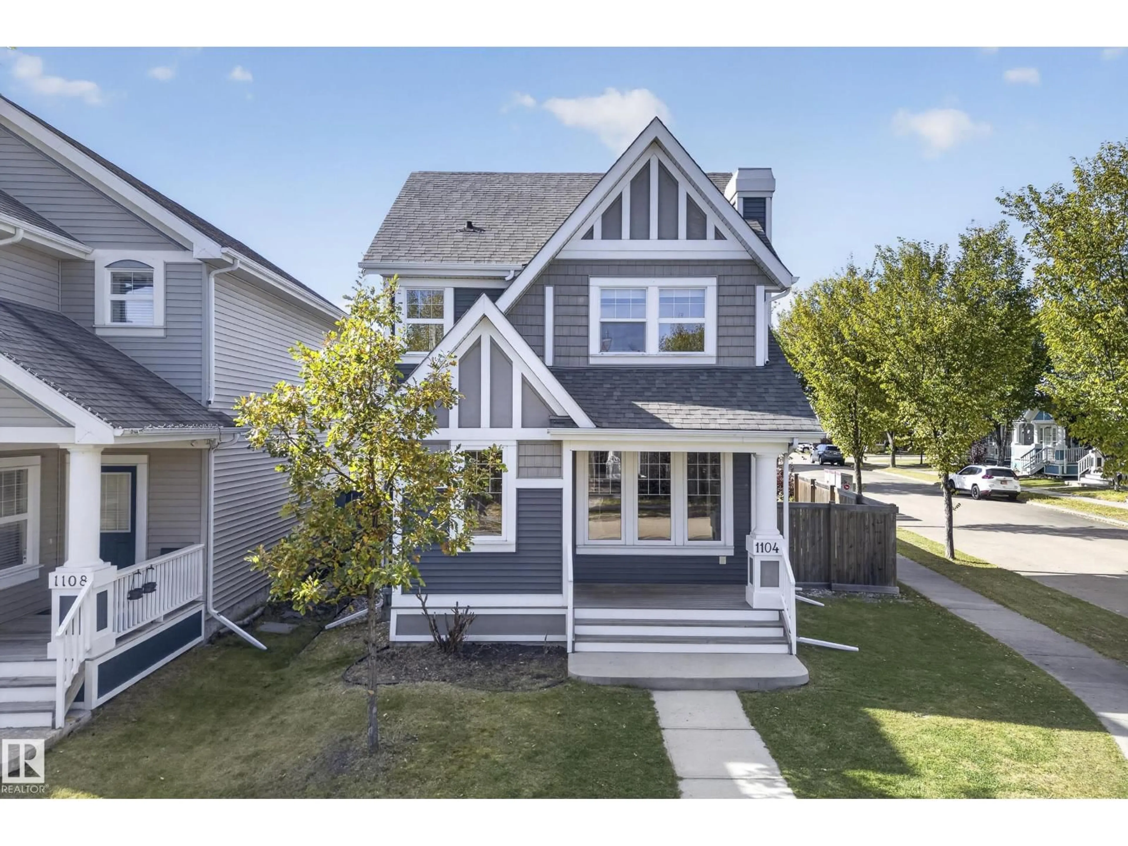 Home with vinyl exterior material, street for 1104 74 ST, Edmonton Alberta T6X0N7
