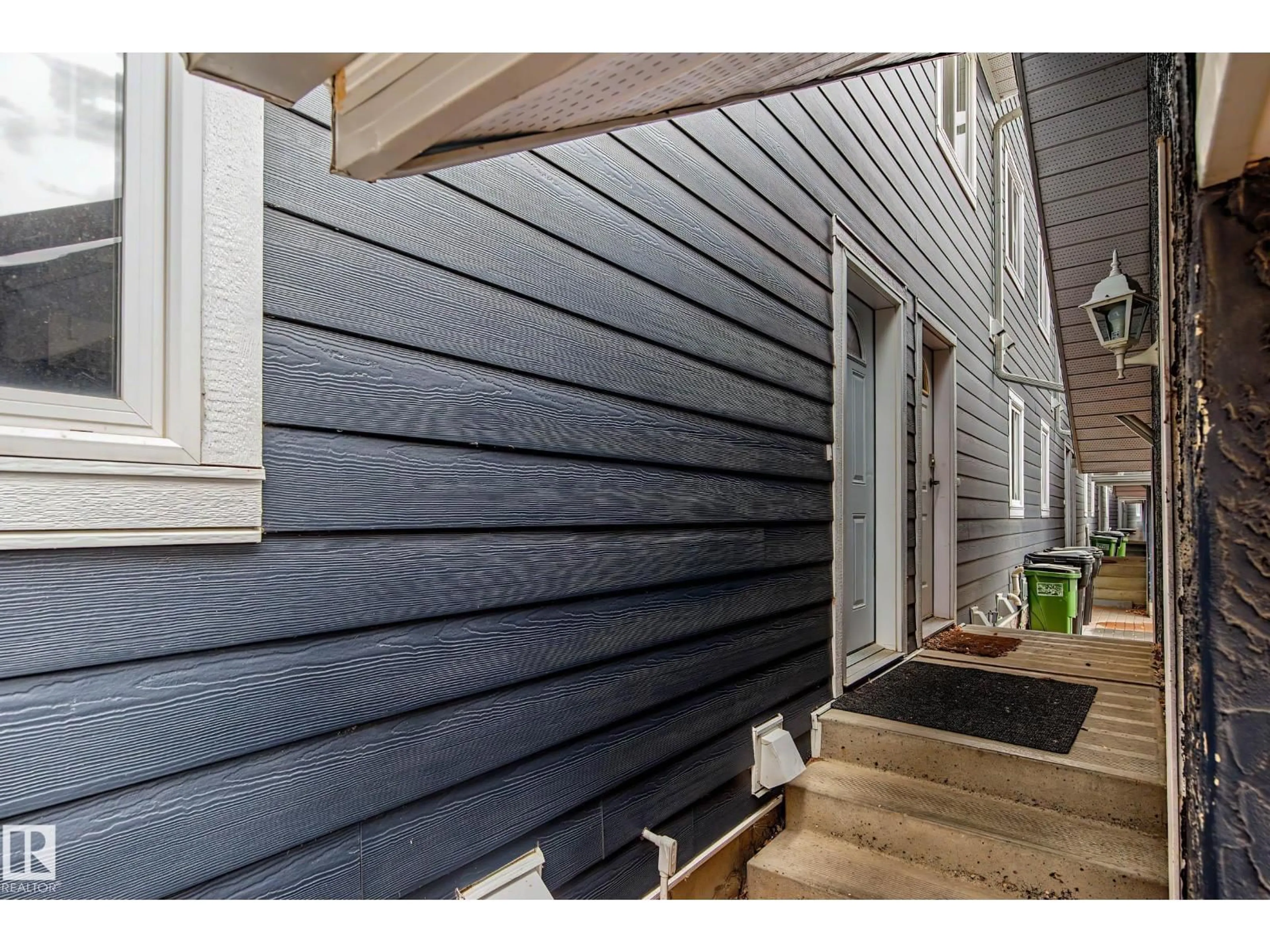 Home with vinyl exterior material, street for #22 - 14803 34 ST, Edmonton Alberta T5Y2L3