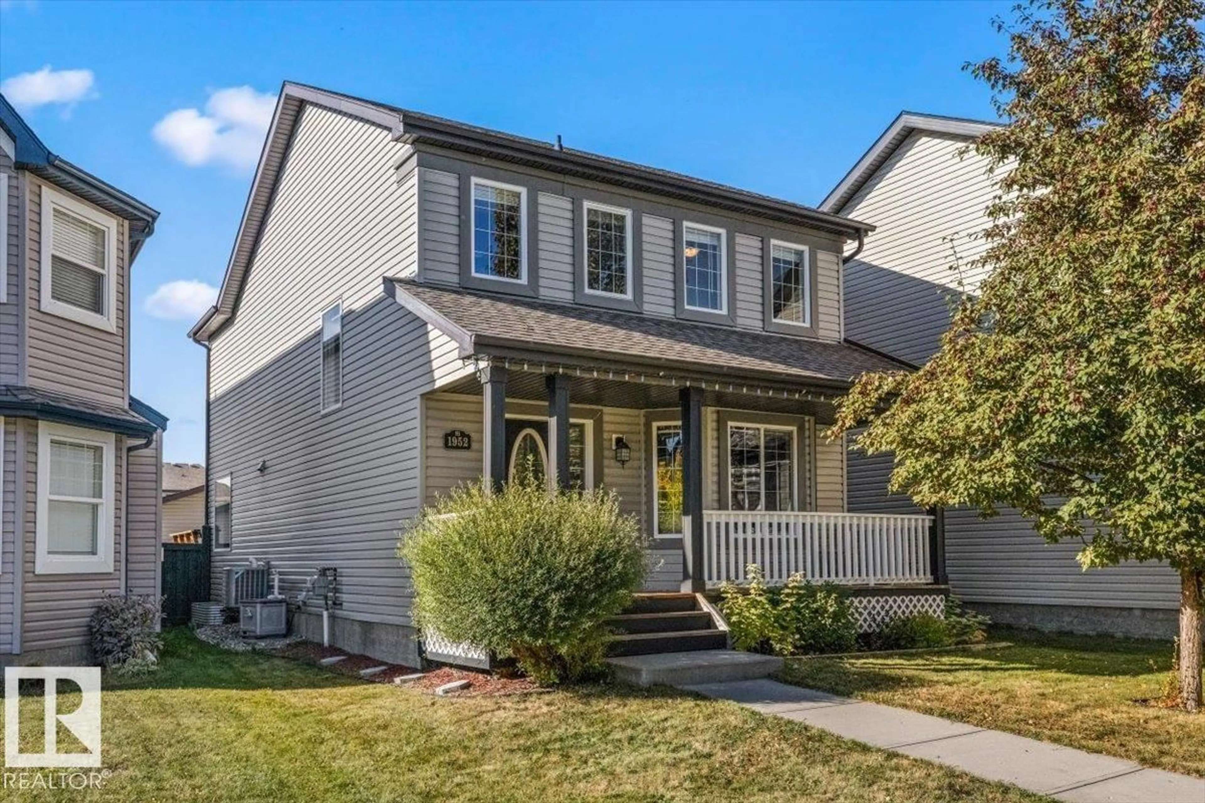 Home with vinyl exterior material, street for 1952 119 ST, Edmonton Alberta T6W0E3